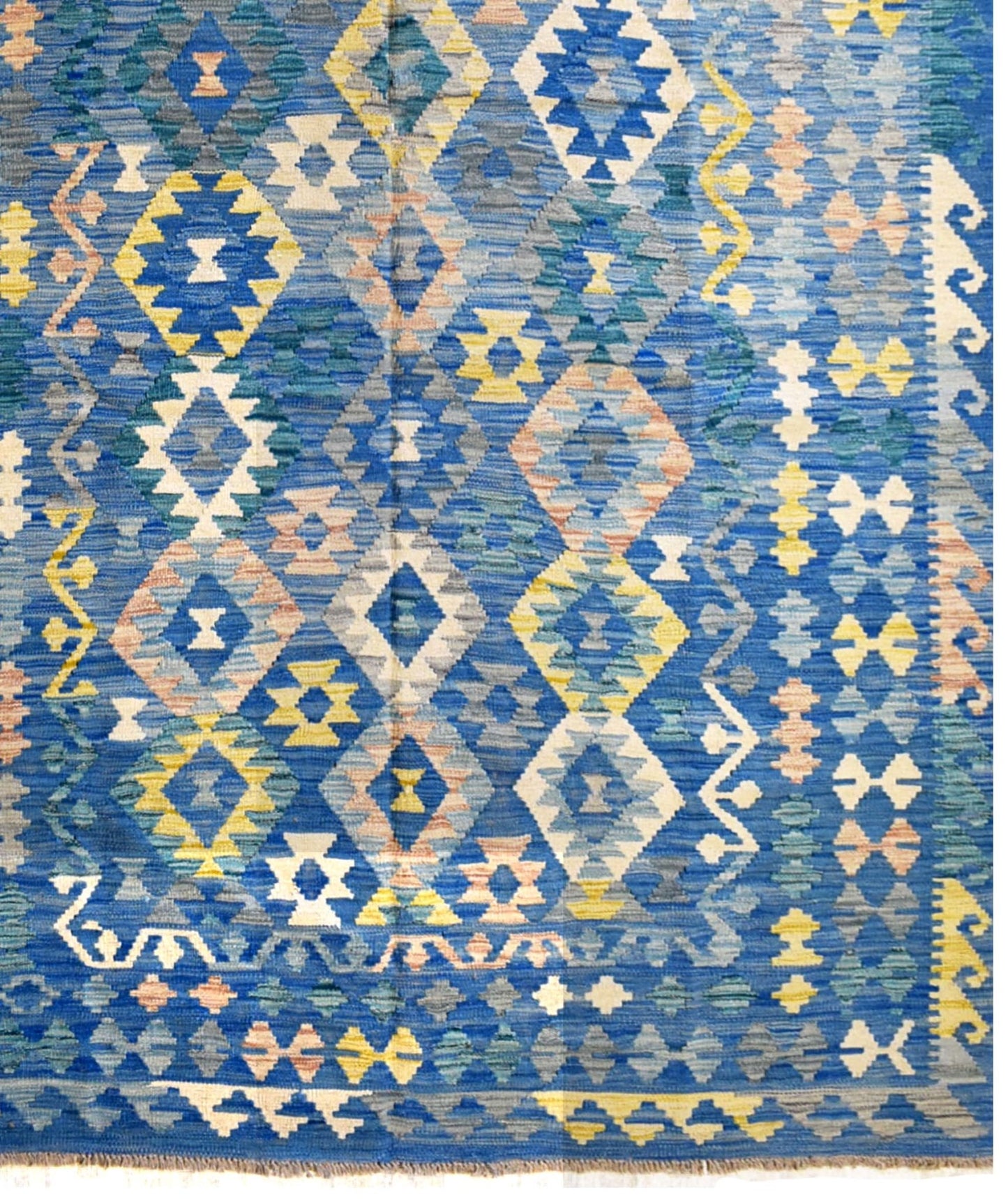 Handmade Afghan Maimana kilim rug featuring a blue field with intricate geometric diamond patterns.