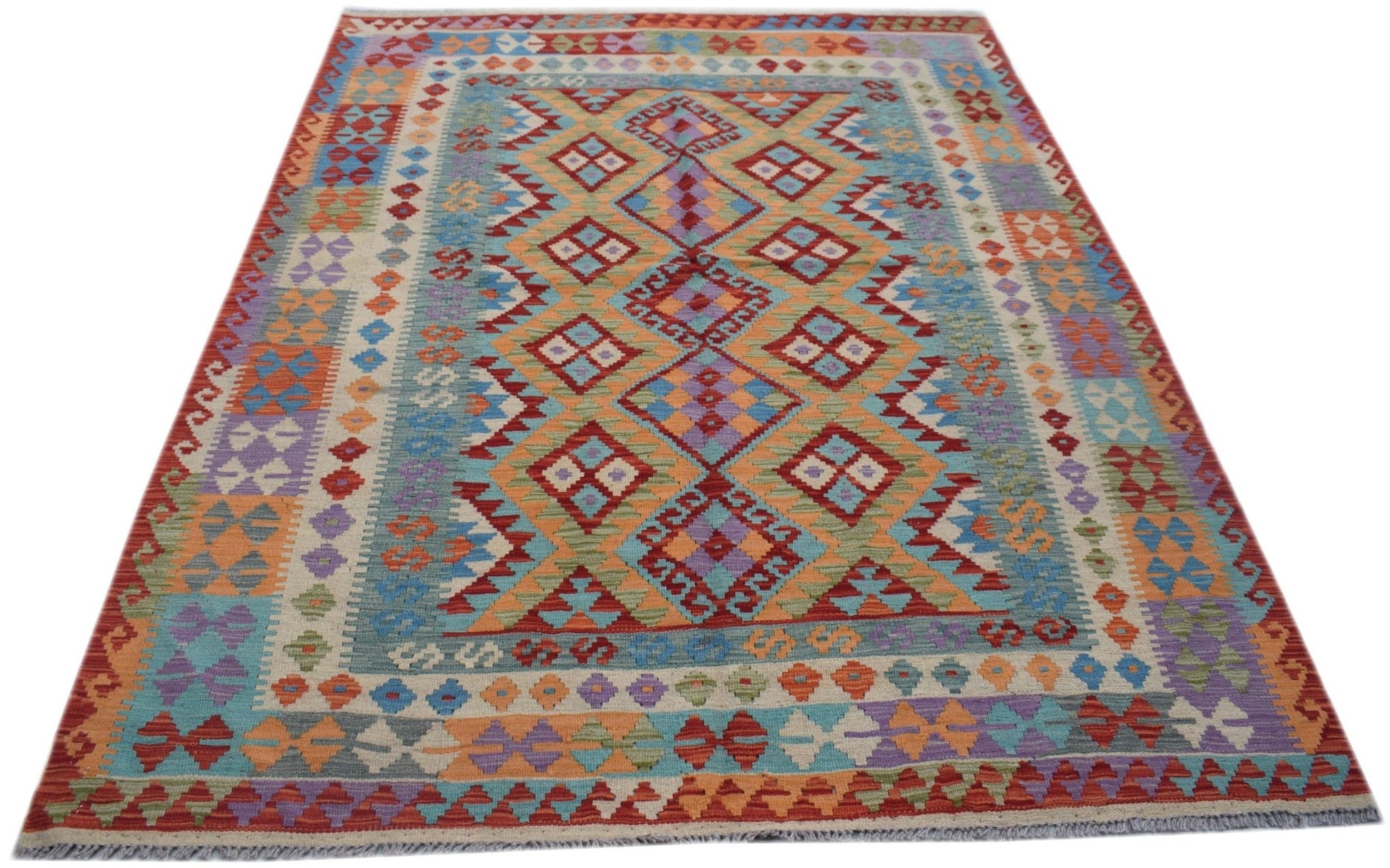 Handwoven Afghan Maimana kilim rug featuring a colorful geometric diamond pattern.
