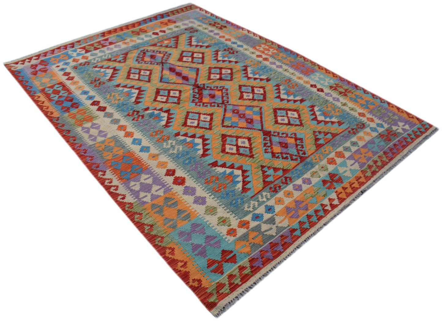 Handmade Afghan Maimana kilim rug featuring a colorful geometric pattern in wool.