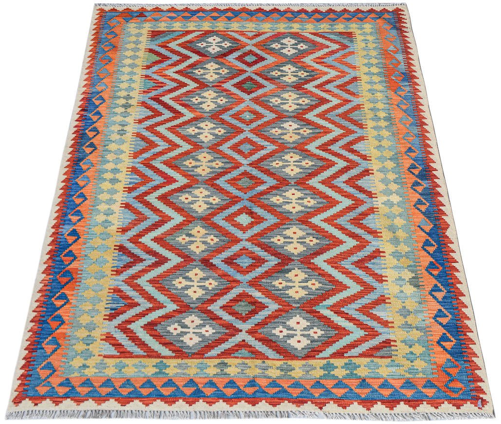 Afghan Maimana Kilim with geometric diamond patterns in red, blue, and yellow.