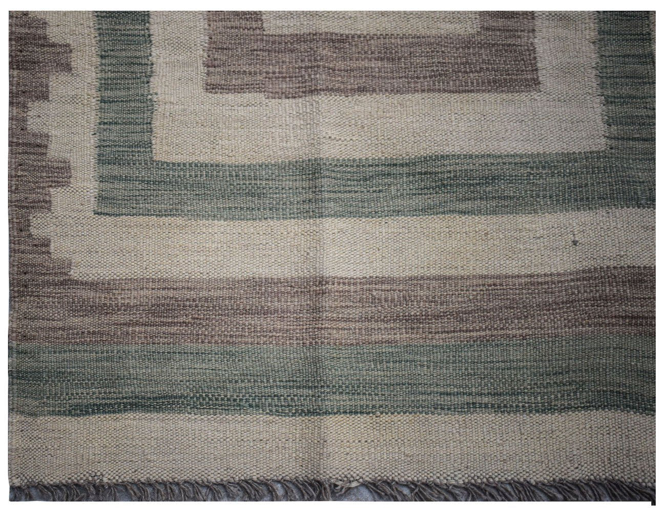 Handwoven Afghan Maimana kilim rug featuring a geometric pattern in muted green and brown tones.