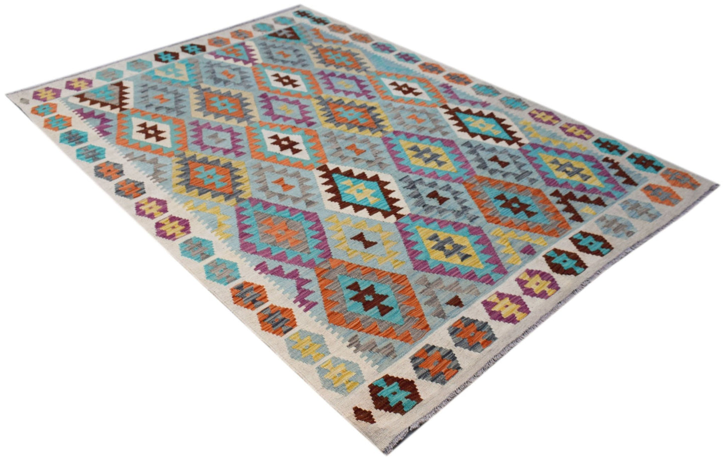 Handwoven Afghan Maimana kilim rug featuring a colorful geometric diamond pattern in wool.