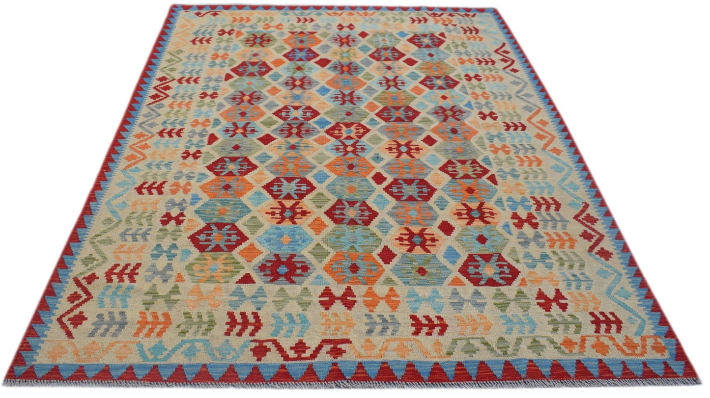 Handwoven Afghan Maimana kilim rug featuring a colorful geometric pattern on a light background.
