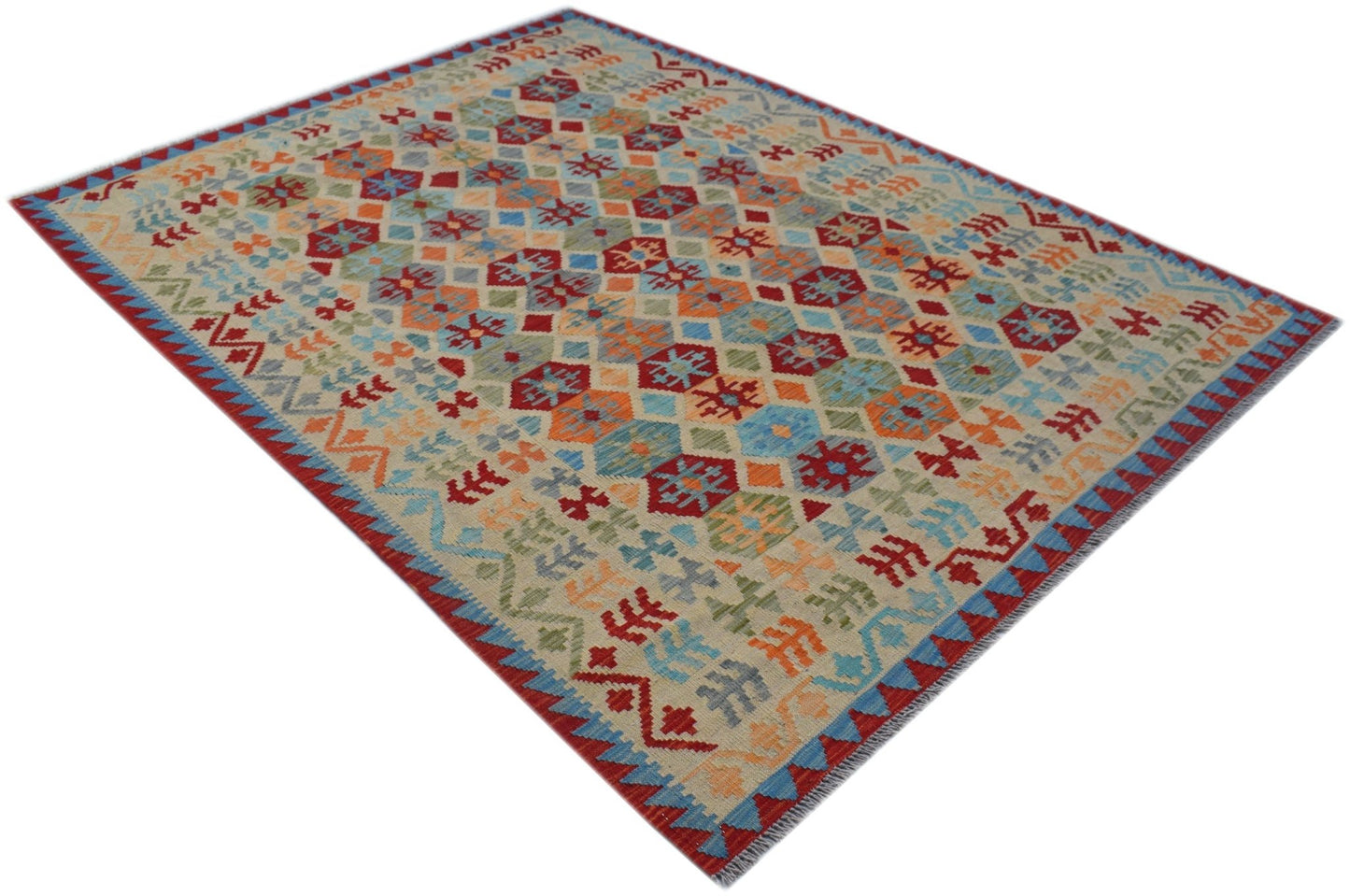 A handmade Afghan Maimana kilim rug featuring a colorful geometric pattern on a flatweave surface.