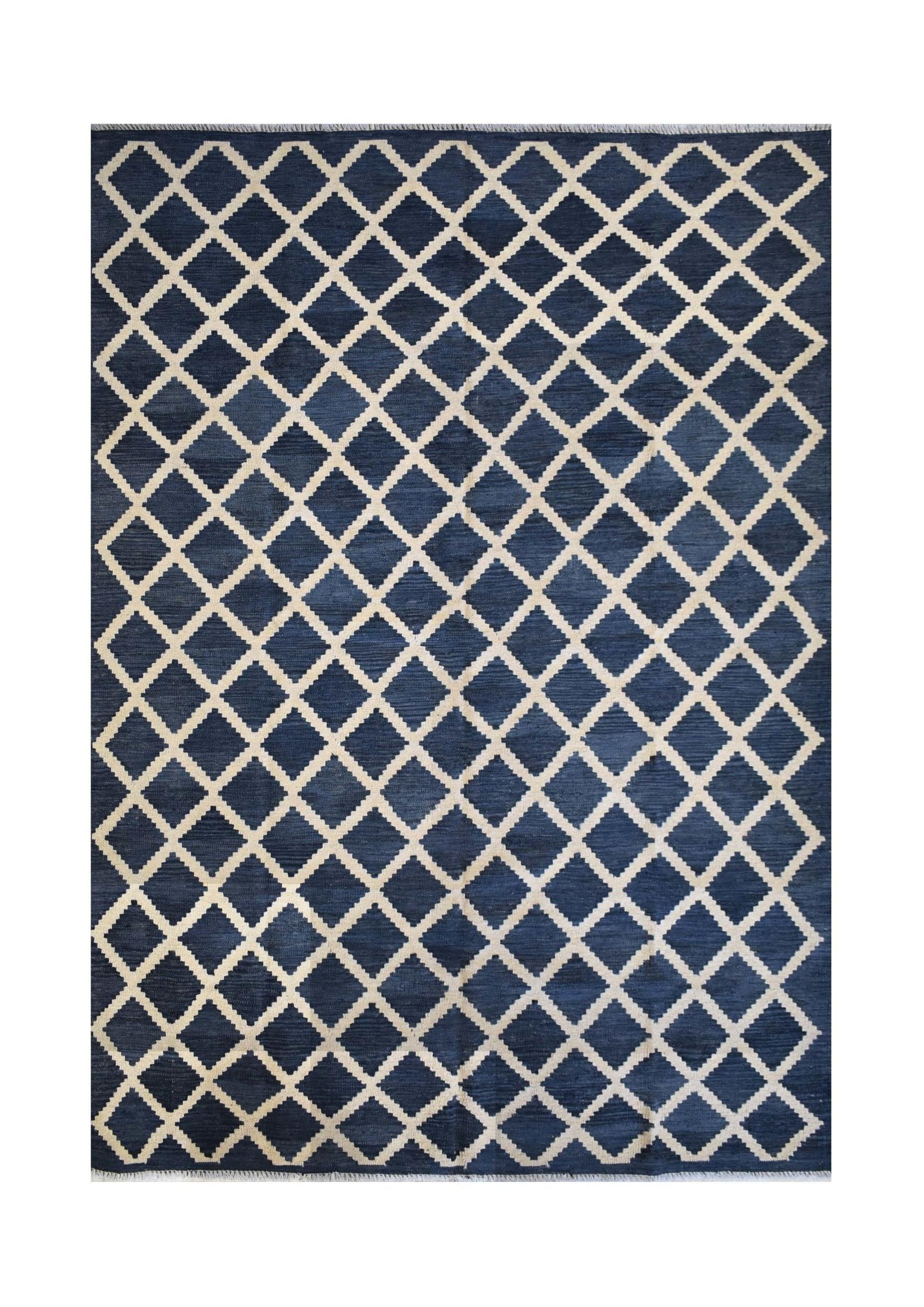Handmade Afghan Maimana kilim rug featuring a dark blue field with a cream diamond grid pattern.