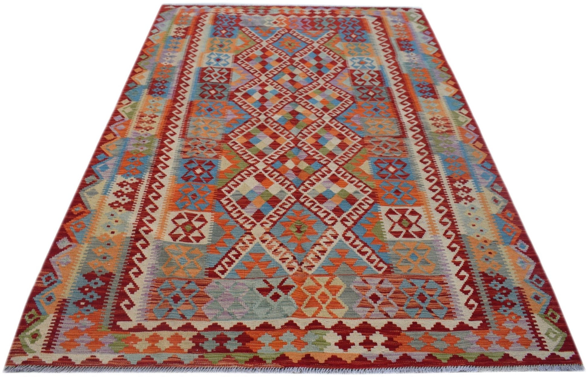 Handwoven Afghan Maimana kilim rug featuring a vibrant geometric pattern in wool.