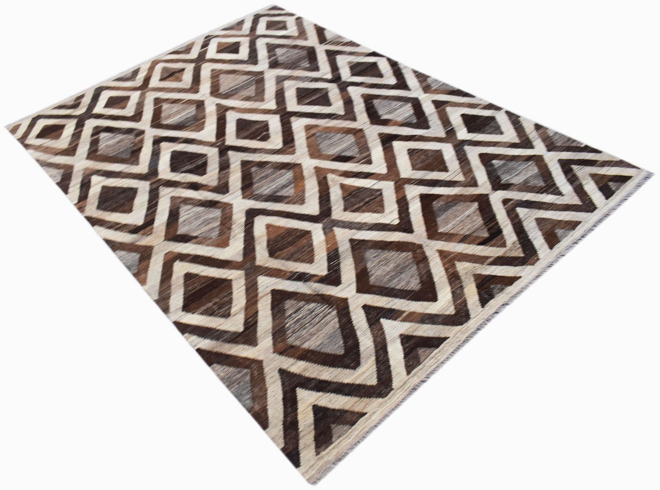 Handwoven Afghan Maimana kilim rug featuring a geometric diamond pattern in brown and cream tones.