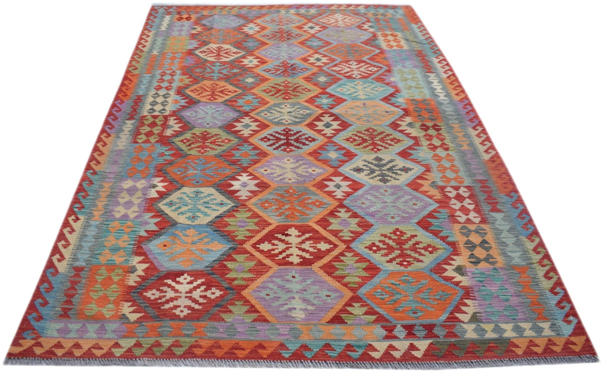 A handmade Afghan Maimana kilim rug featuring a colorful geometric diamond pattern in wool.