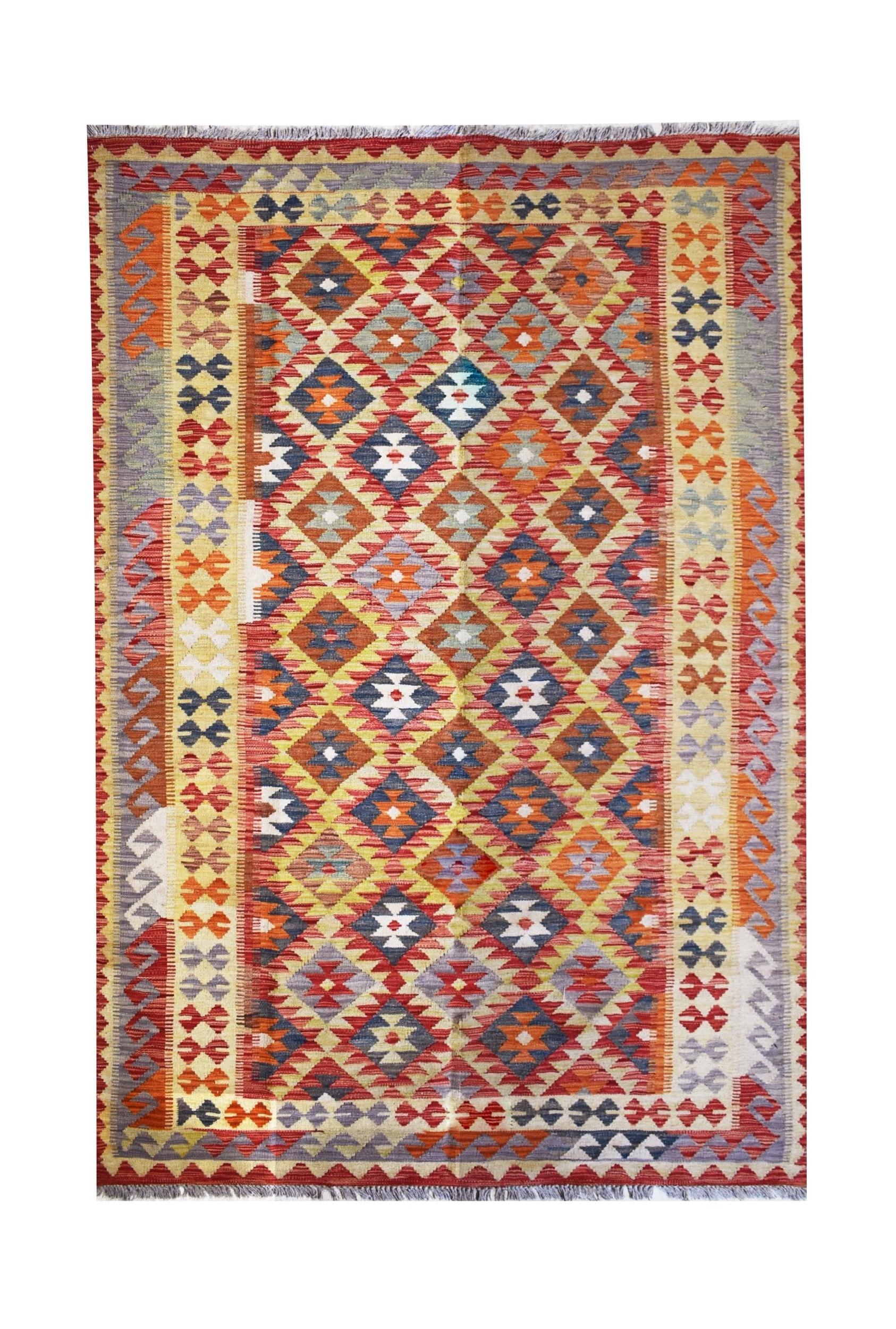 Handmade Afghan Maimana kilim rug featuring a vibrant geometric diamond pattern in wool.