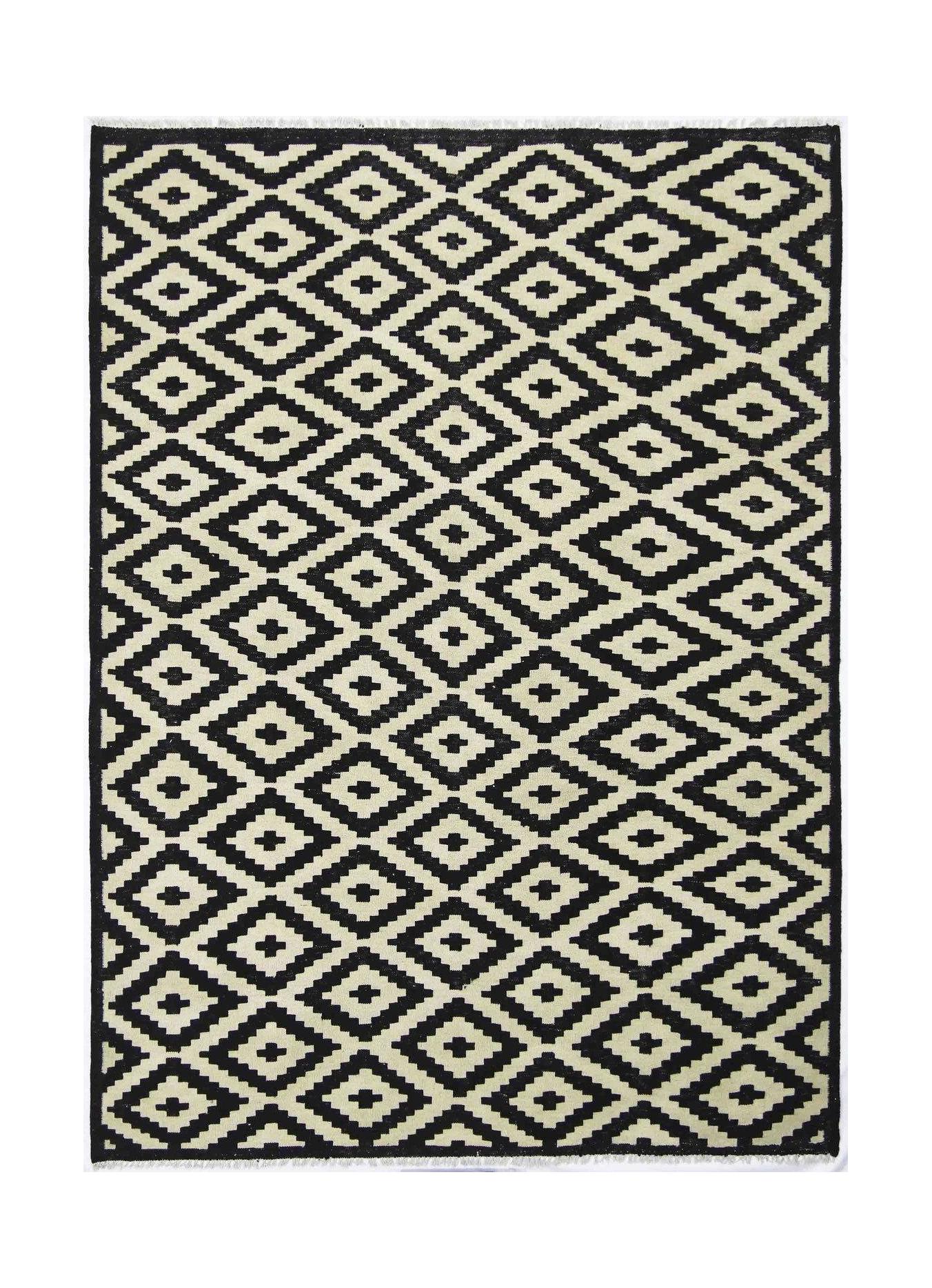 Handmade Afghan Maimana kilim rug featuring a black and cream geometric diamond pattern.