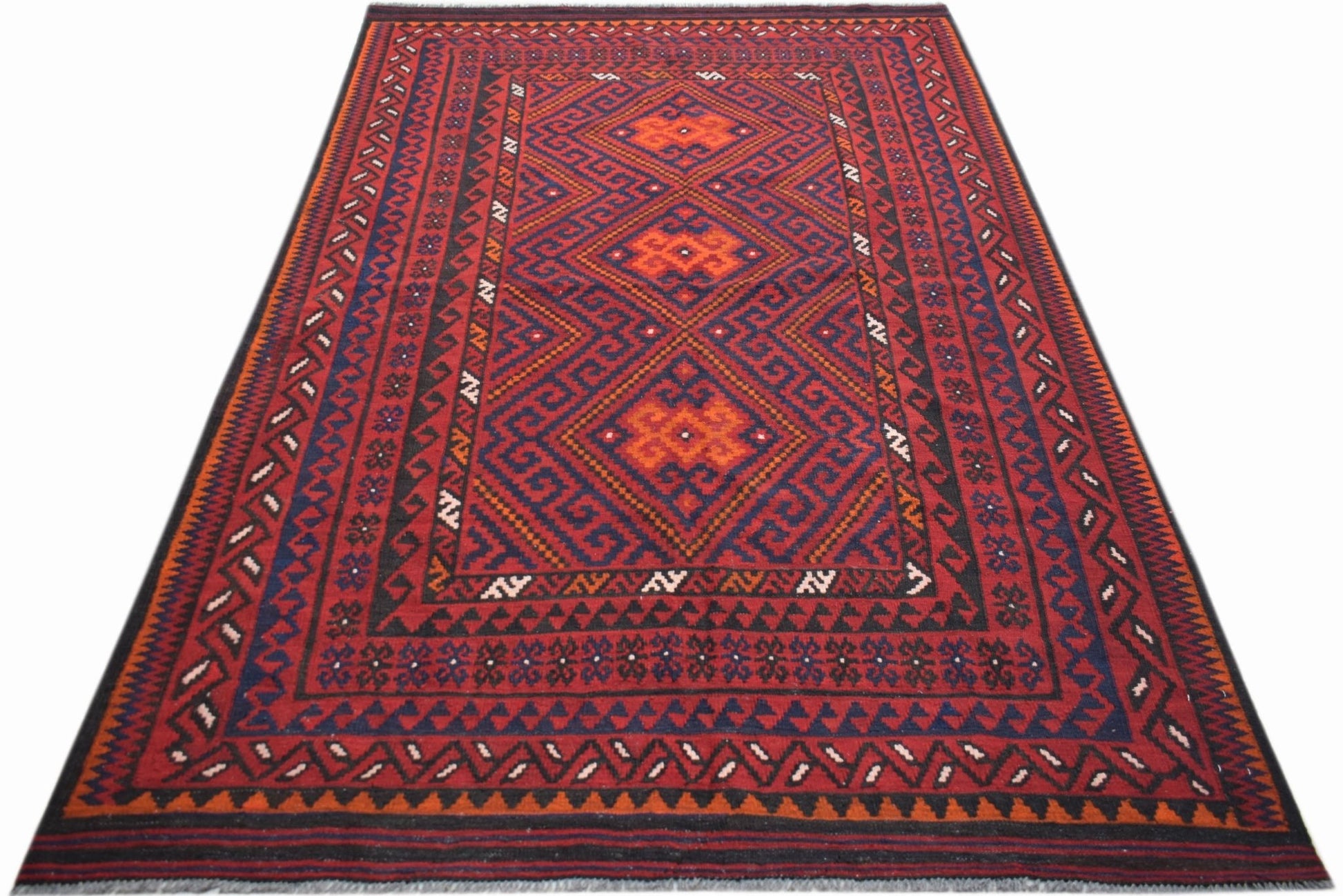 Handwoven Afghan Maimana kilim rug featuring a geometric diamond pattern in red and blue wool.