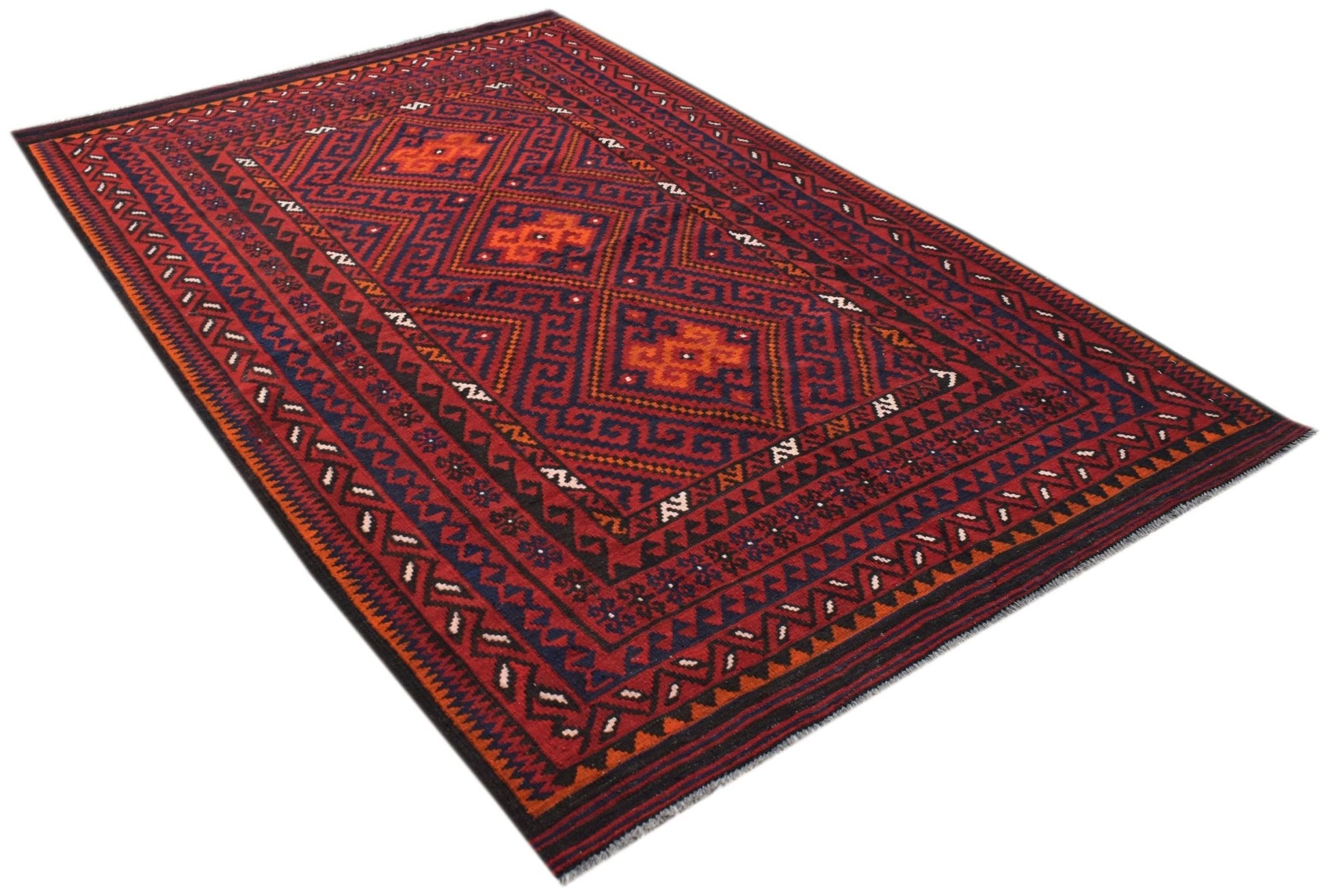 A rectangular Afghan Maimana kilim rug featuring geometric diamond patterns in red and orange.