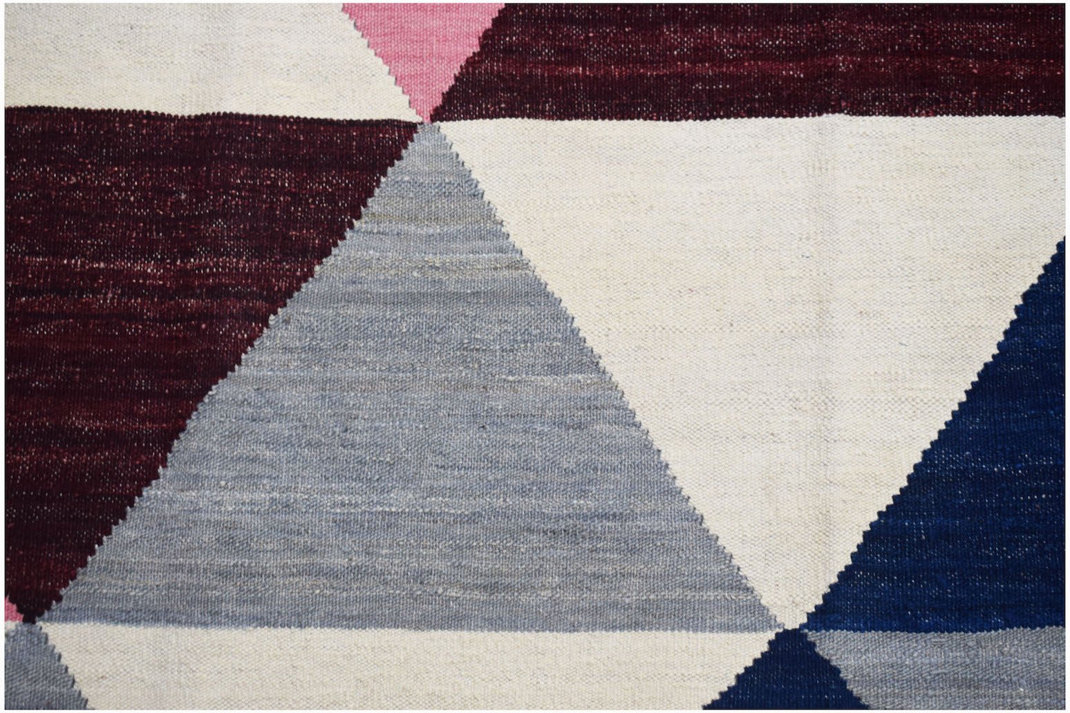 Handwoven Afghan Maimana kilim featuring a geometric pattern of cream, grey, blue, and maroon.