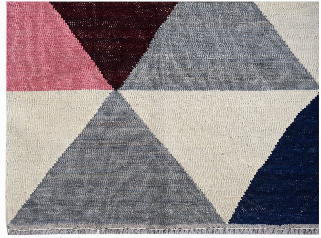 Afghan Maimana Kilim with geometric triangles in pink, burgundy, grey, cream, and navy.