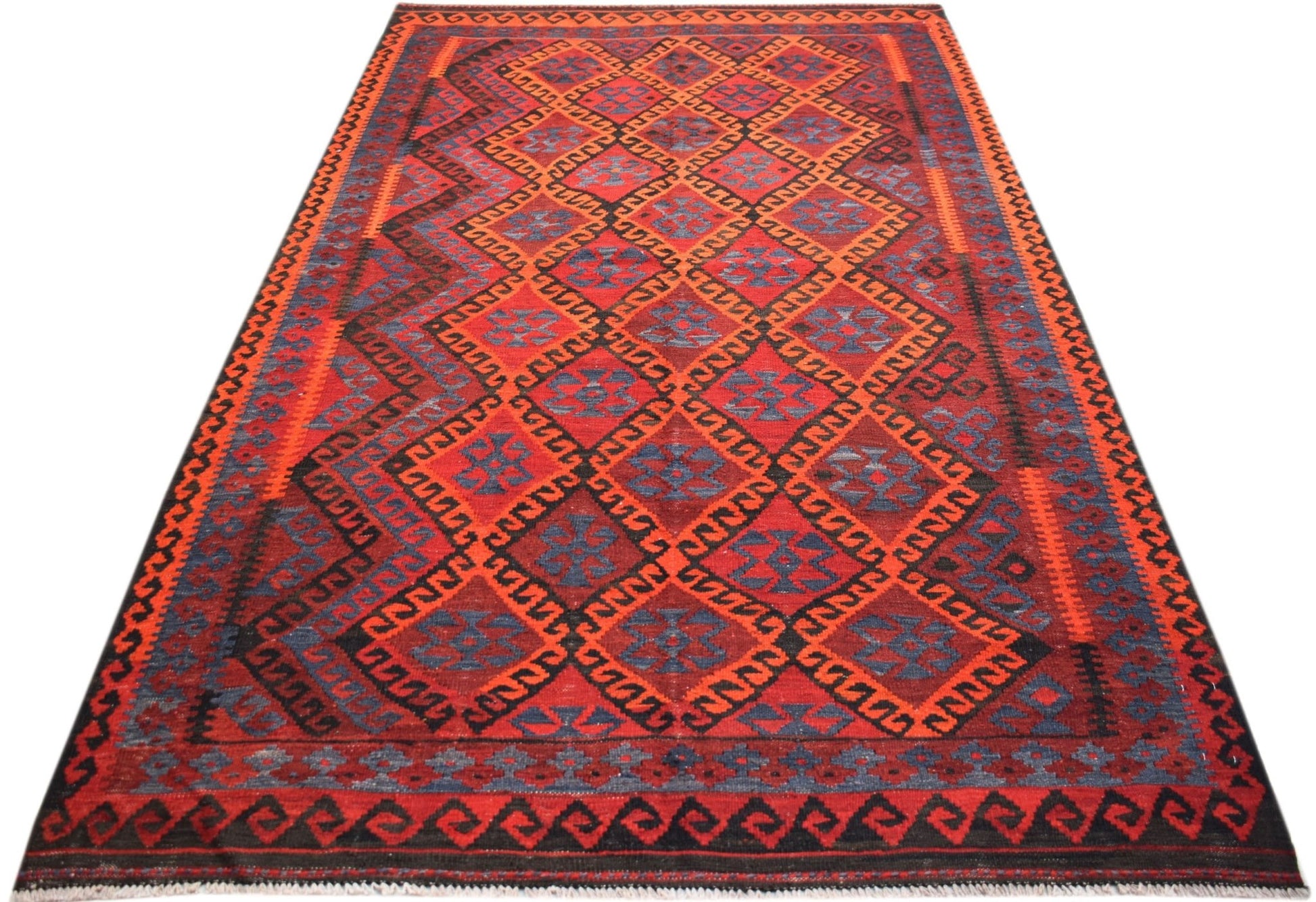 Handwoven Afghan Maimana kilim rug featuring a geometric diamond pattern in red and blue wool.