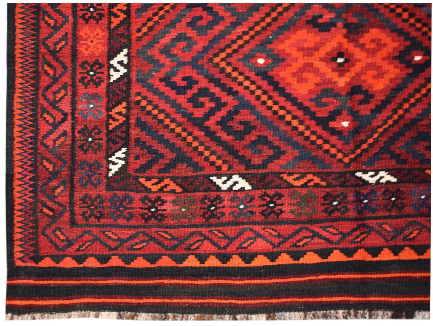 Handwoven Afghan Maimana kilim featuring a geometric diamond pattern in red, black, and orange.