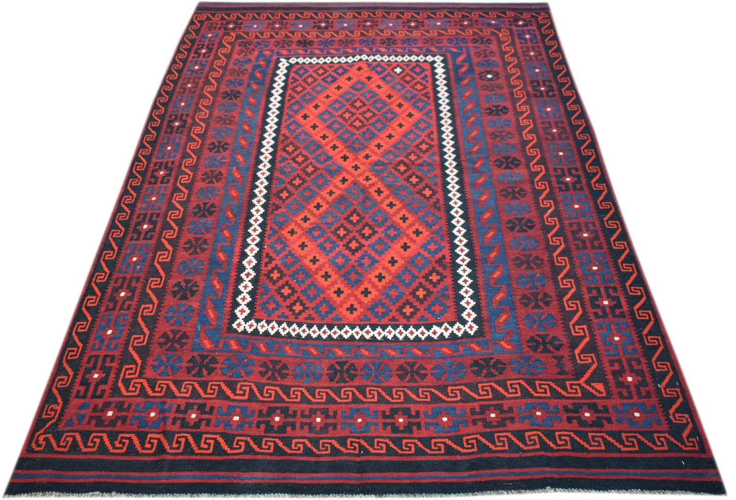Handwoven Afghan Maimana kilim featuring a geometric diamond pattern in red and blue wool.