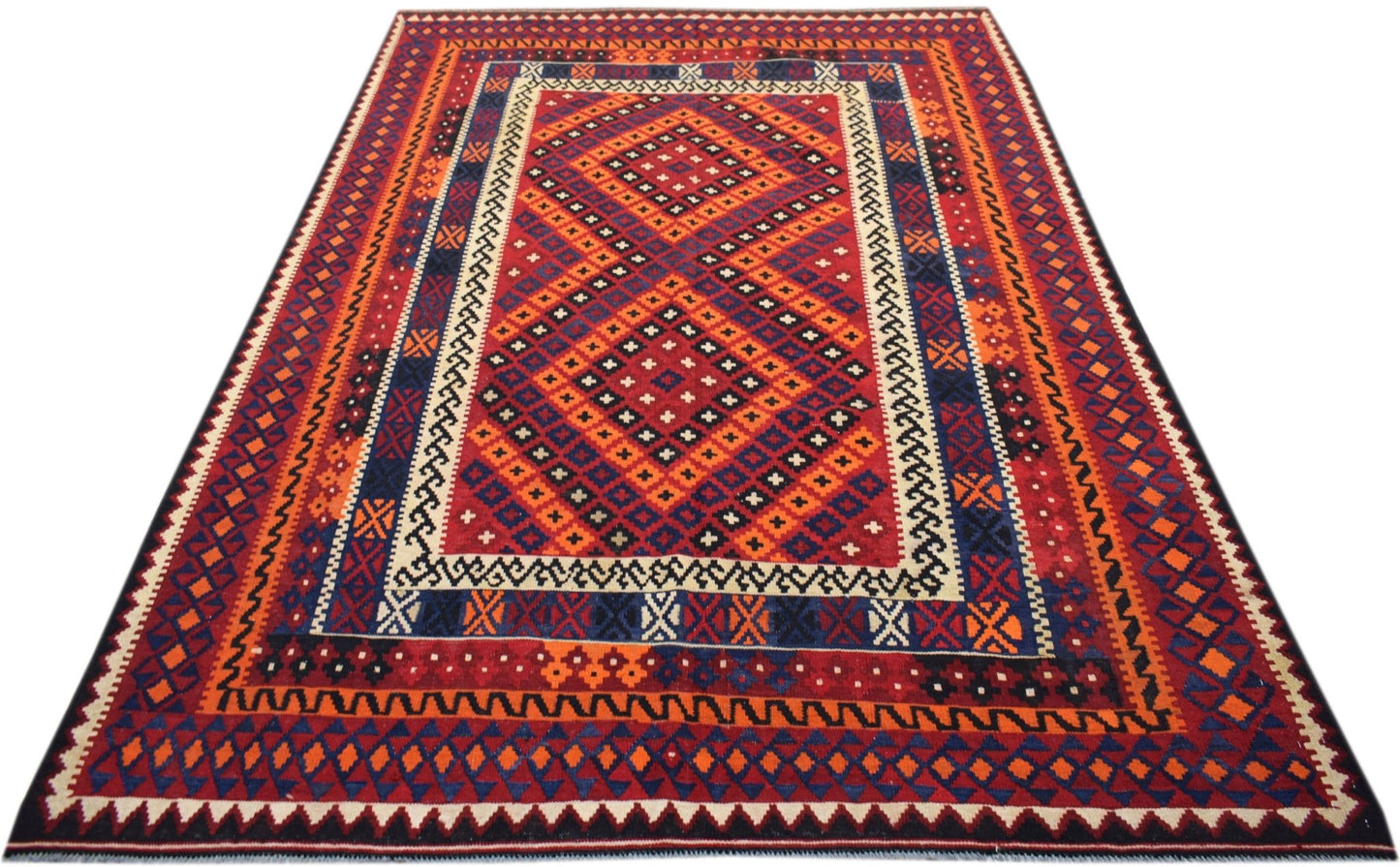 Handwoven Afghan Maimana Kilim rug featuring a geometric diamond pattern in red, blue, and orange.