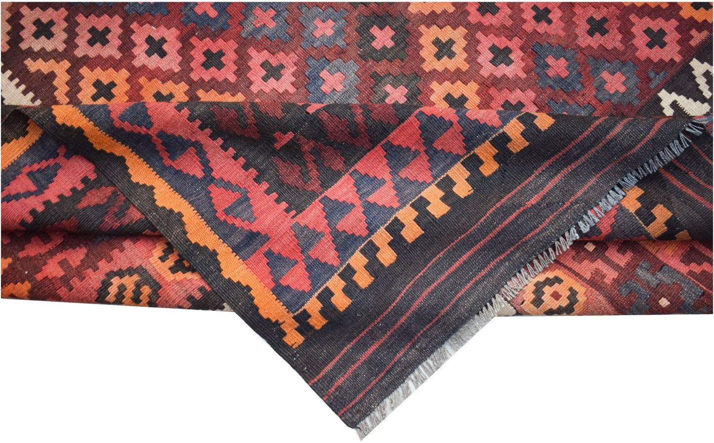 Handwoven Afghan Maimana kilim featuring a geometric pattern in red, orange, and dark blue wool.