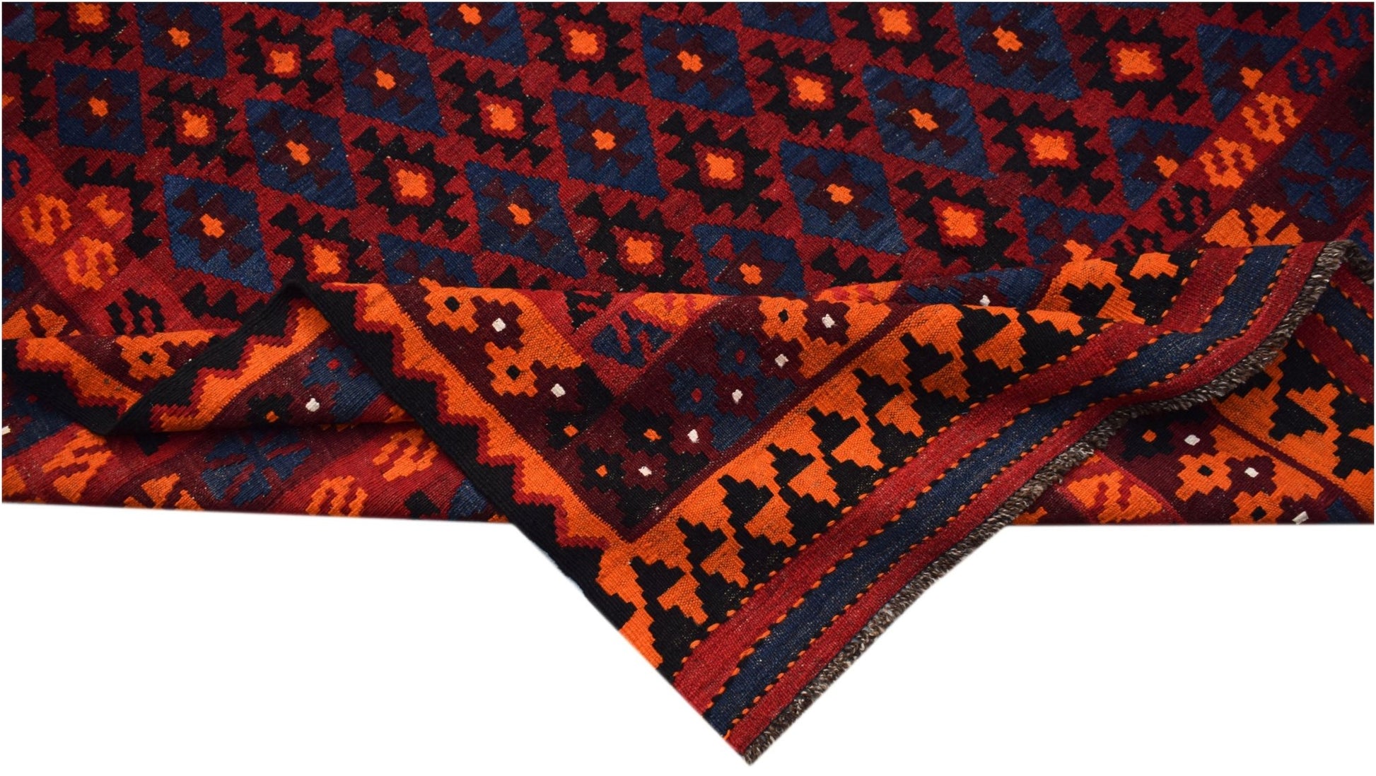 Handwoven Afghan Maimana kilim featuring a geometric pattern in red, blue, and orange wool.