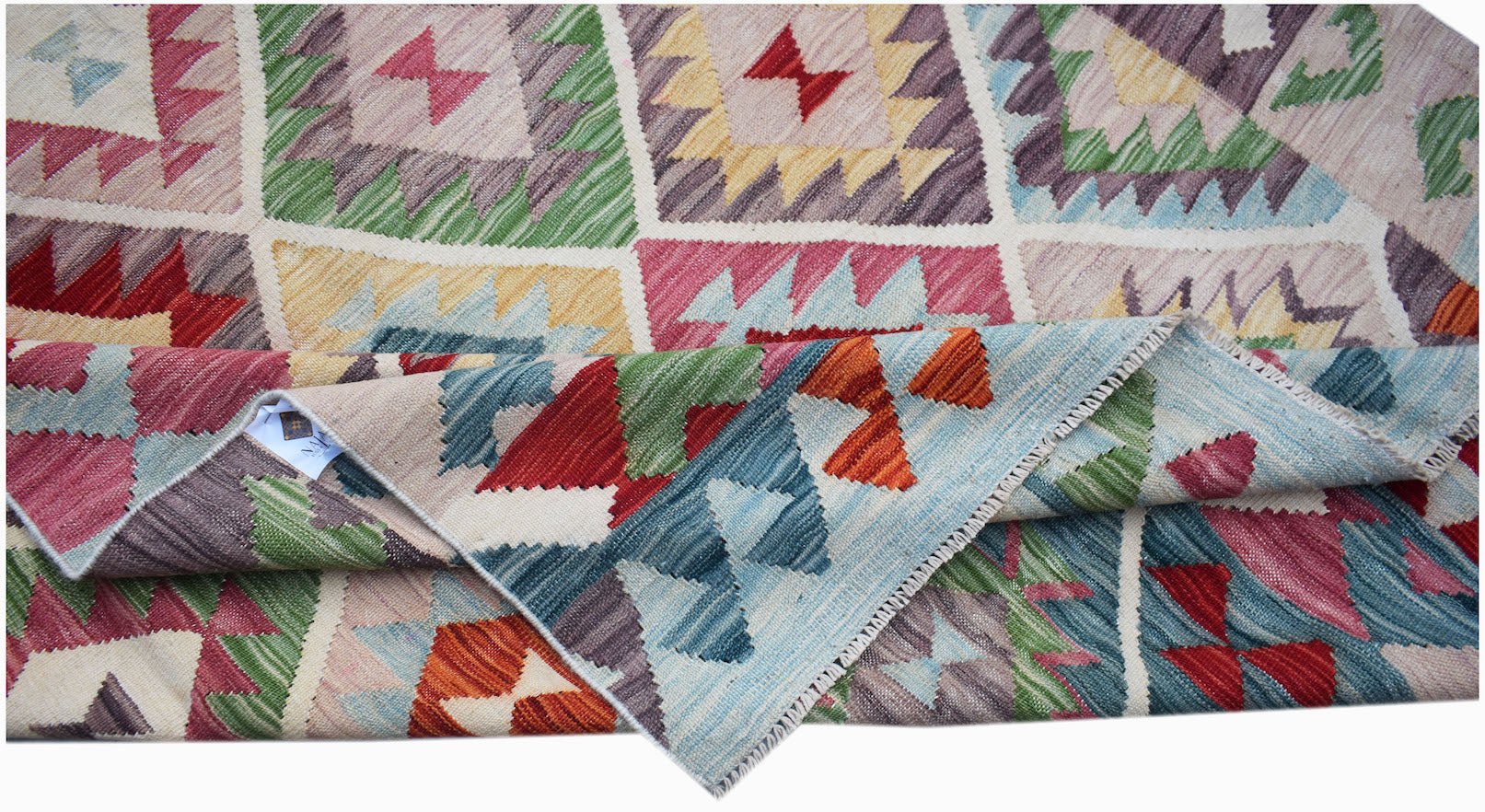 Handwoven Afghan Maimana kilim rug featuring a colorful geometric pattern and flatweave texture.