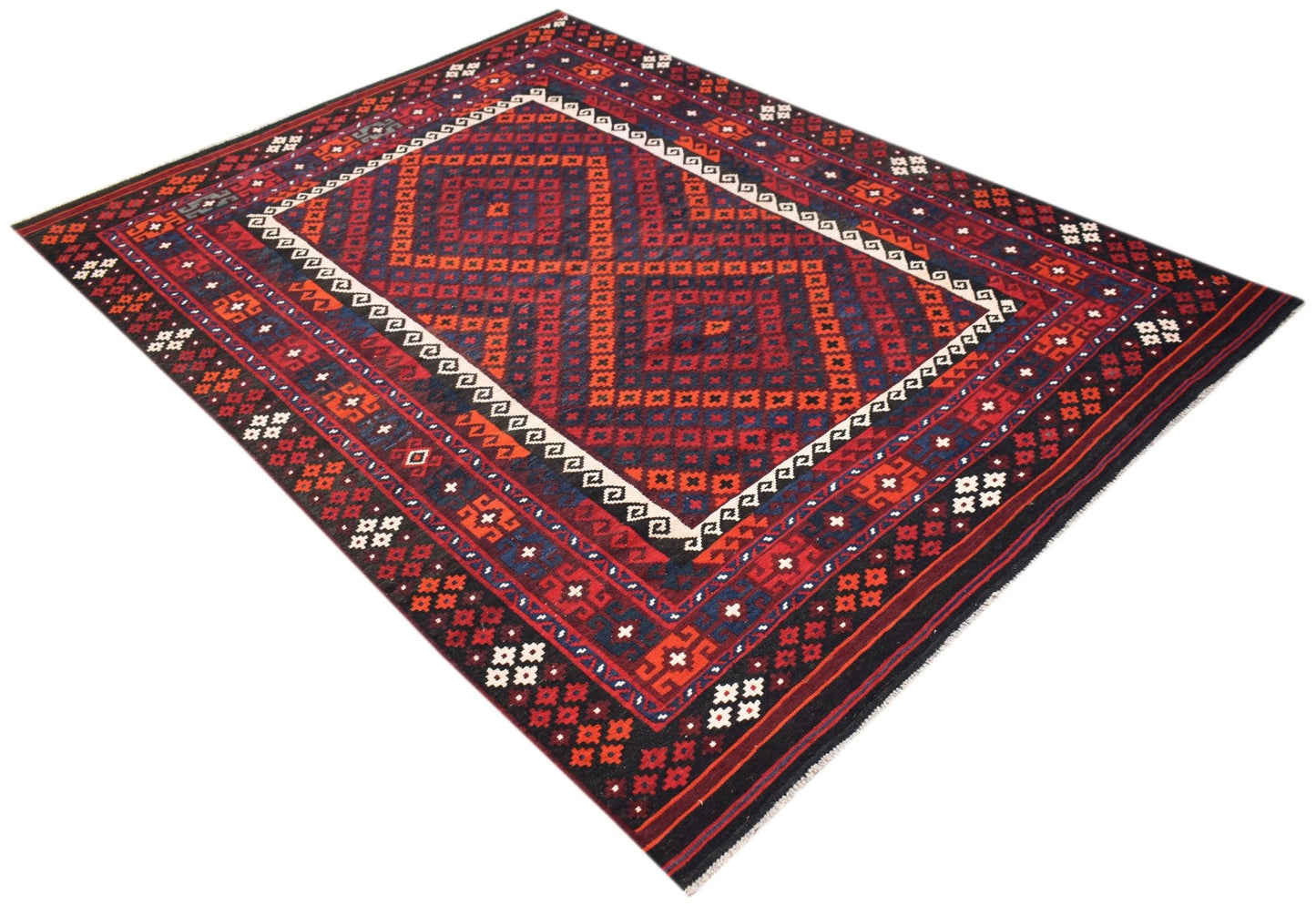 Handwoven Afghan Maimana kilim rug featuring a geometric pattern in red, blue, and cream tones.
