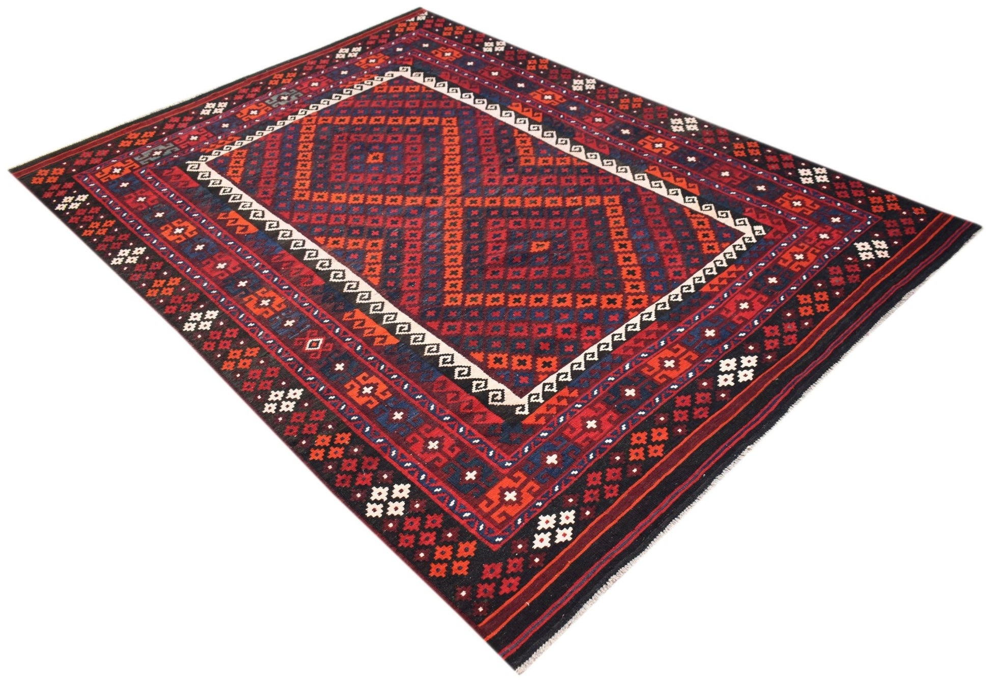 Handwoven Afghan Maimana kilim rug featuring a geometric pattern in red, blue, and cream tones.