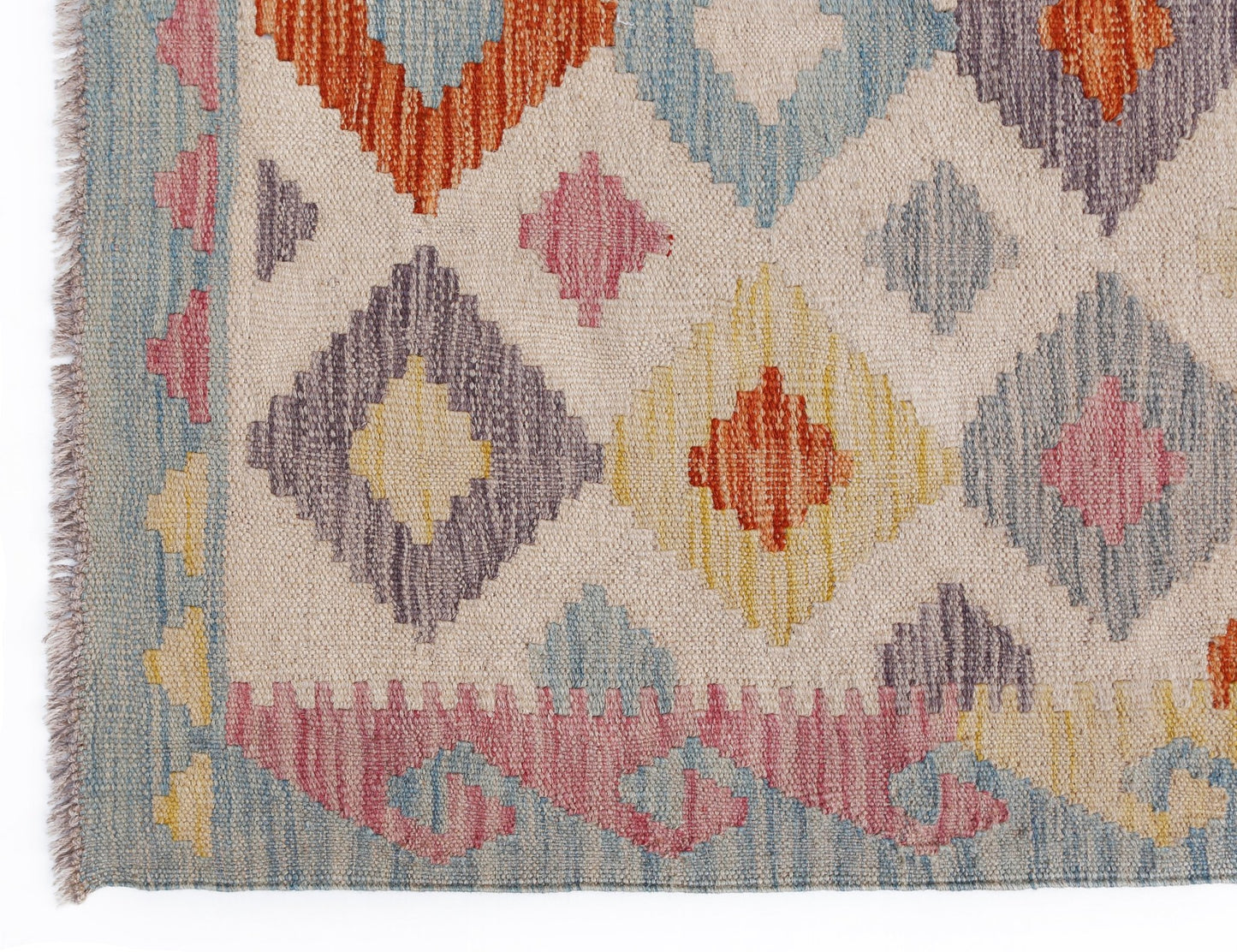 Handwoven Afghan Maimana kilim rug featuring a geometric diamond pattern in multicolored wool.