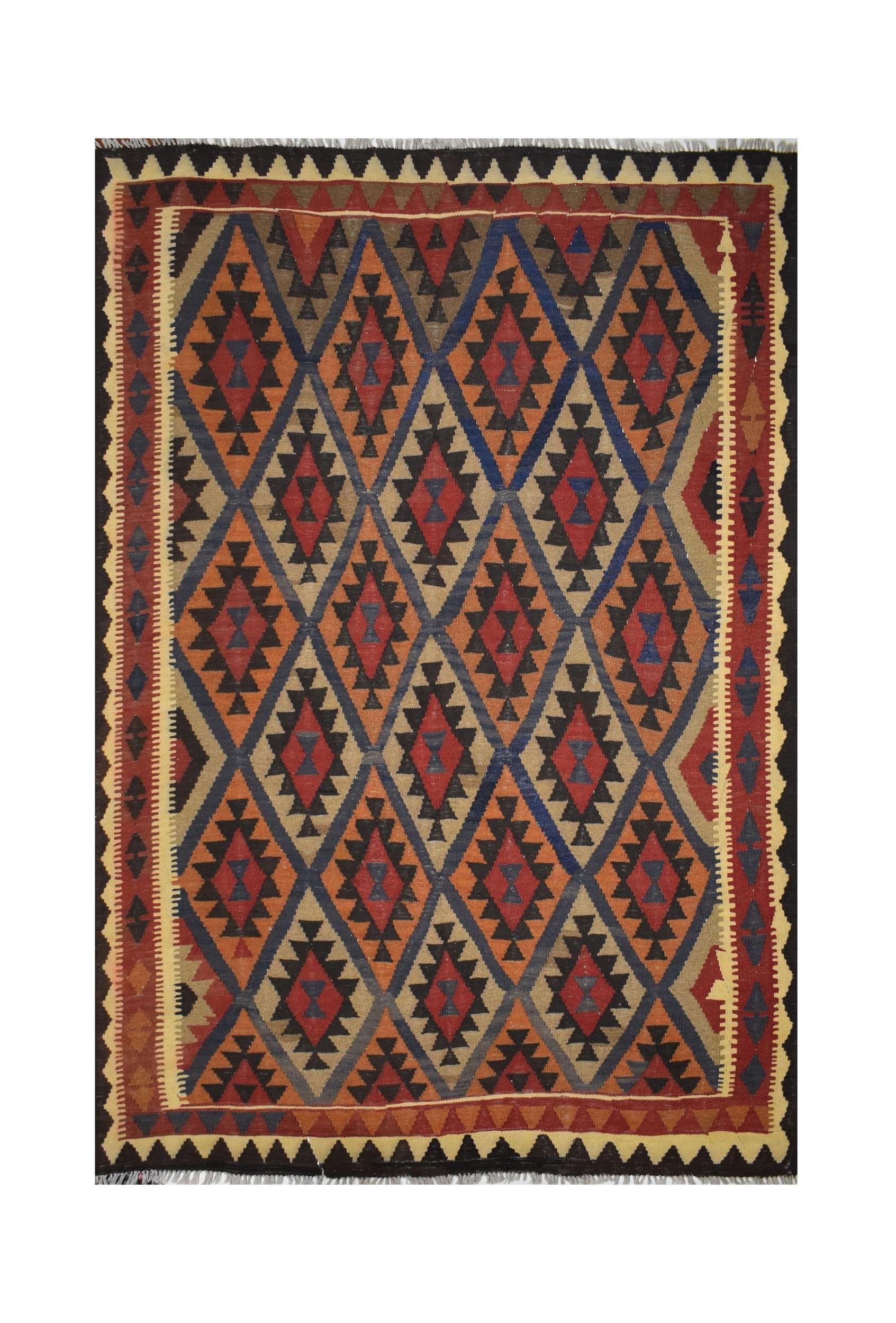 Handmade Afghan Maimana kilim rug featuring a repeating diamond pattern in earthy tones.