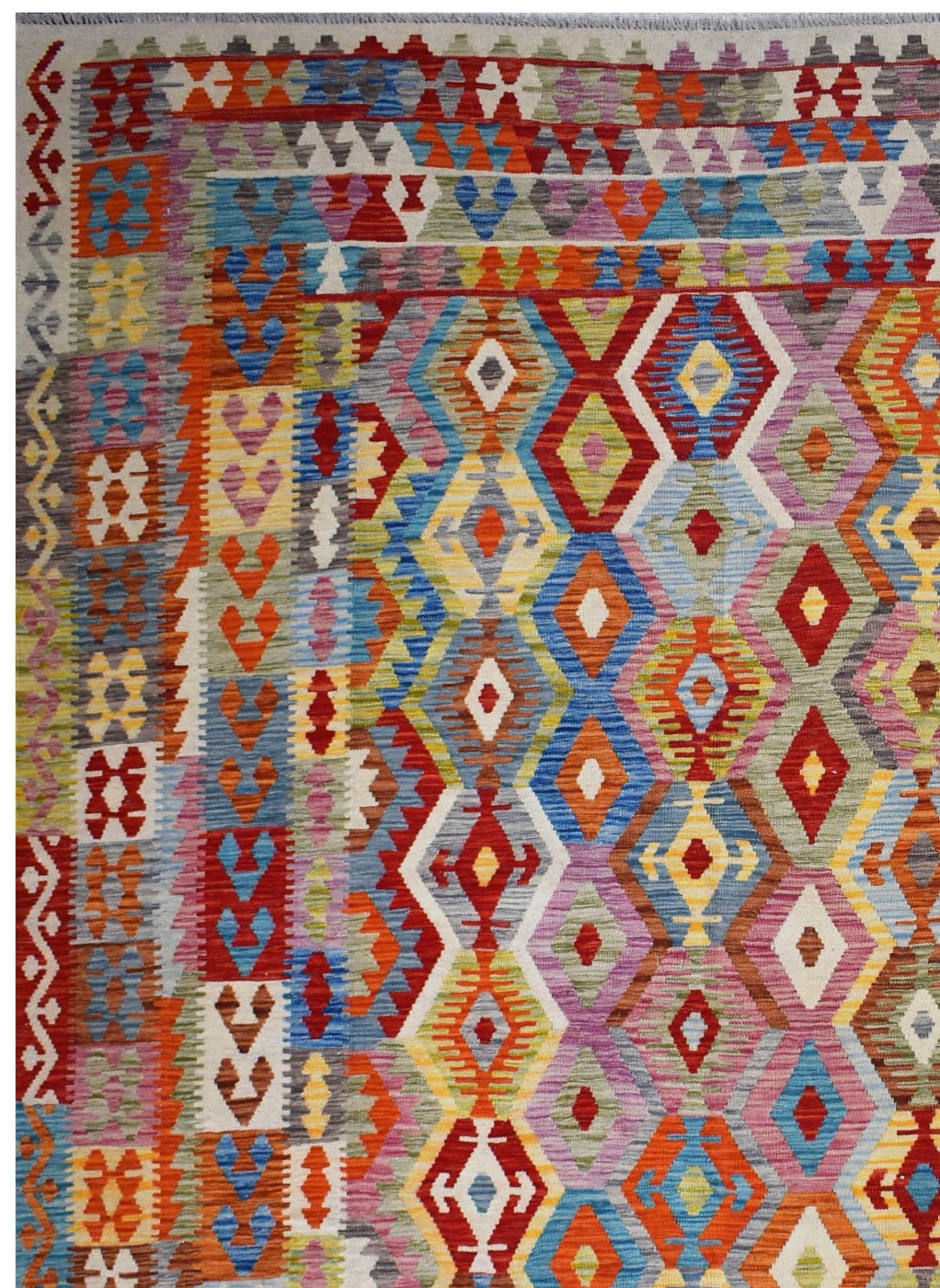 Handmade Afghan Maimana kilim rug featuring a vibrant, multicolored geometric diamond pattern.