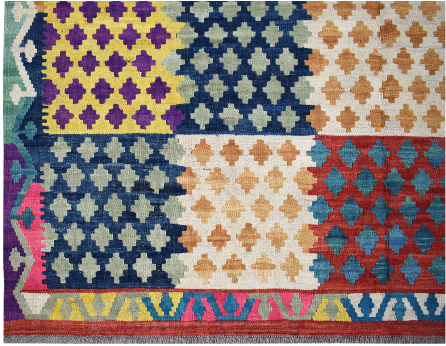Handmade Afghan Maimana kilim rug featuring a colorful geometric patchwork pattern in wool.