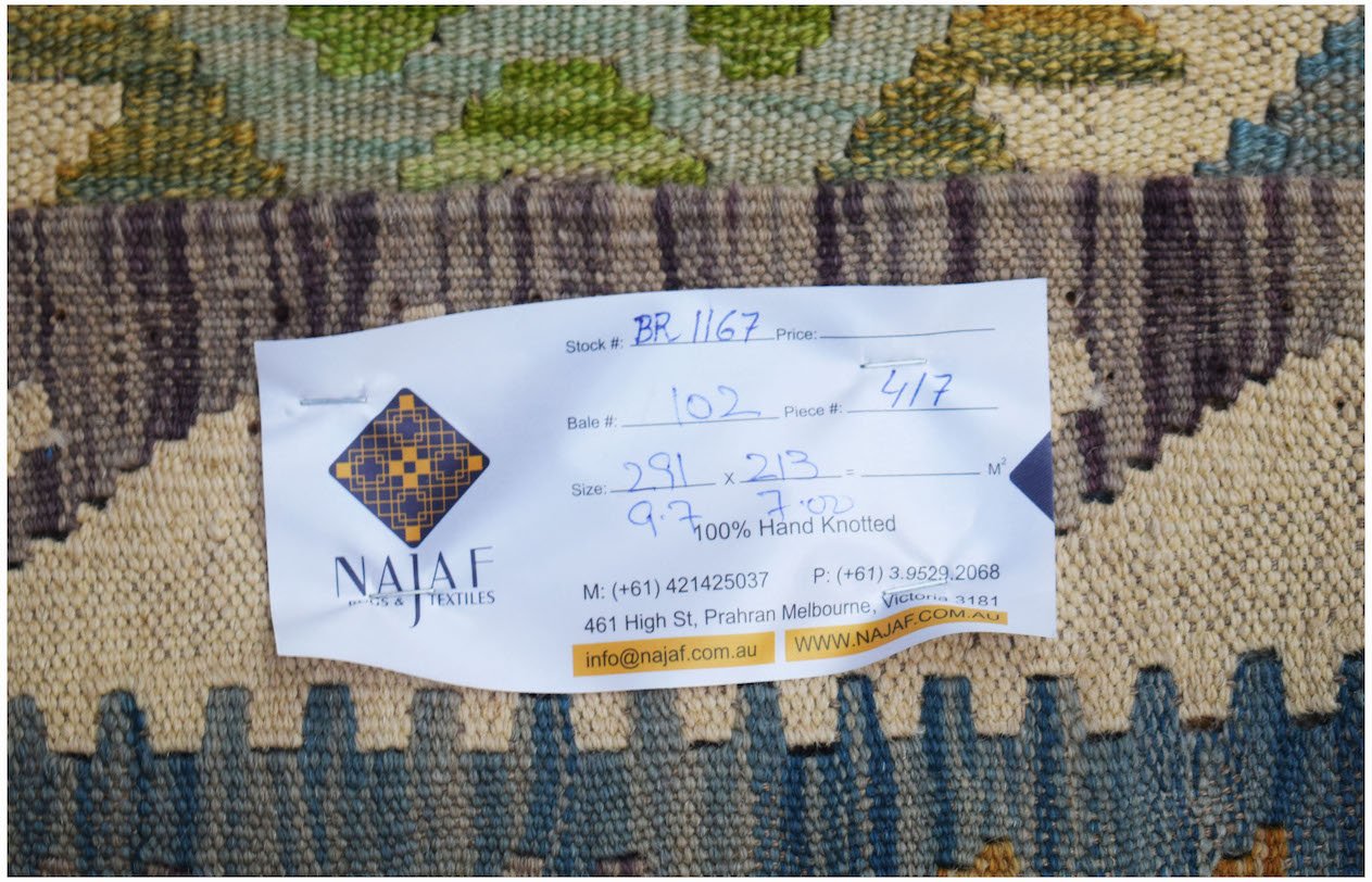 A flatwoven Afghan Maimana Kilim rug featuring a geometric pattern in green, blue, and beige.