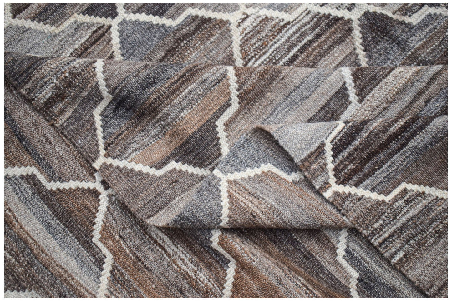 Afghan Maimana Kilim with geometric pattern in brown and grey tones.