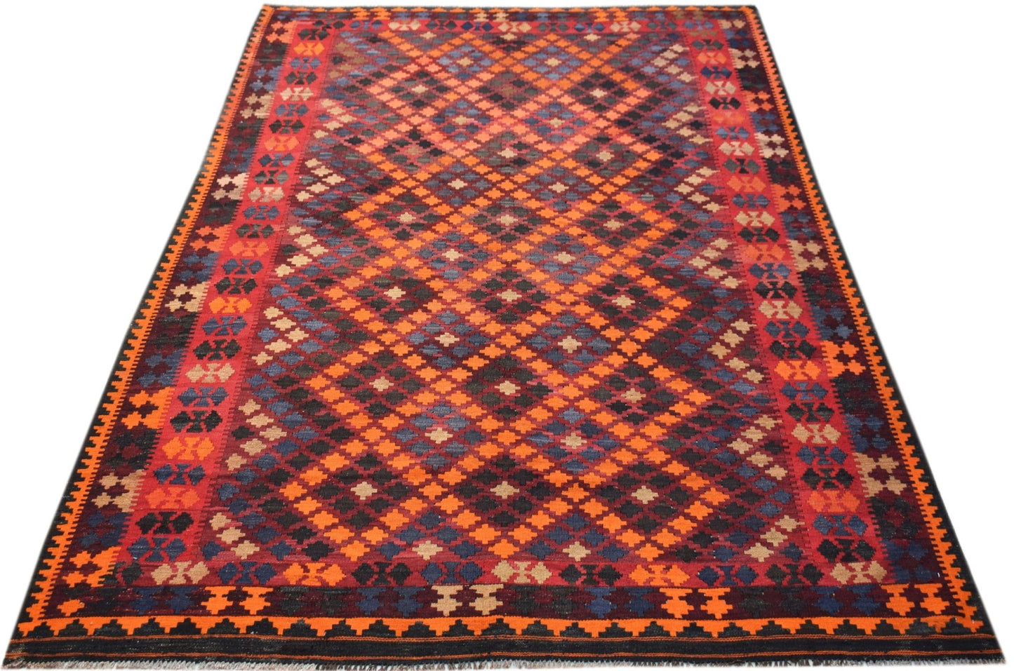 Handwoven Afghan Maimana kilim rug featuring a vibrant geometric diamond pattern in wool.