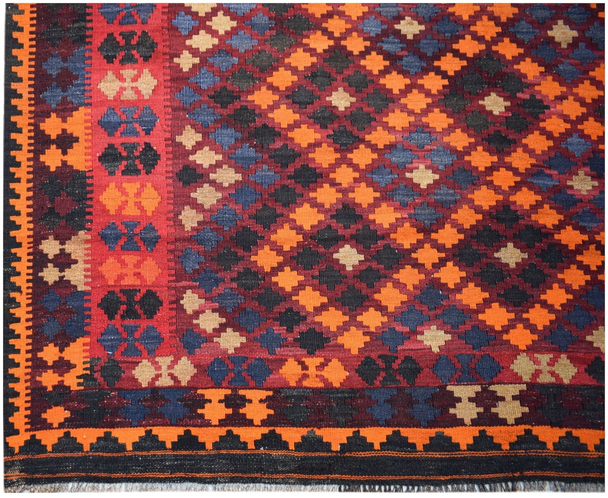 Handwoven Afghan Maimana kilim featuring a geometric diamond pattern in orange, blue, and black.