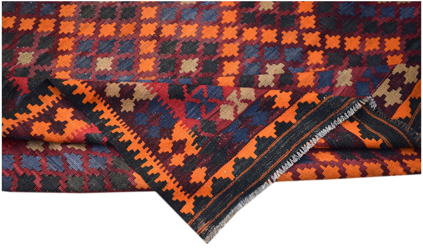 Handwoven Afghan Maimana kilim rug featuring a geometric pattern in orange, blue, and tan wool.