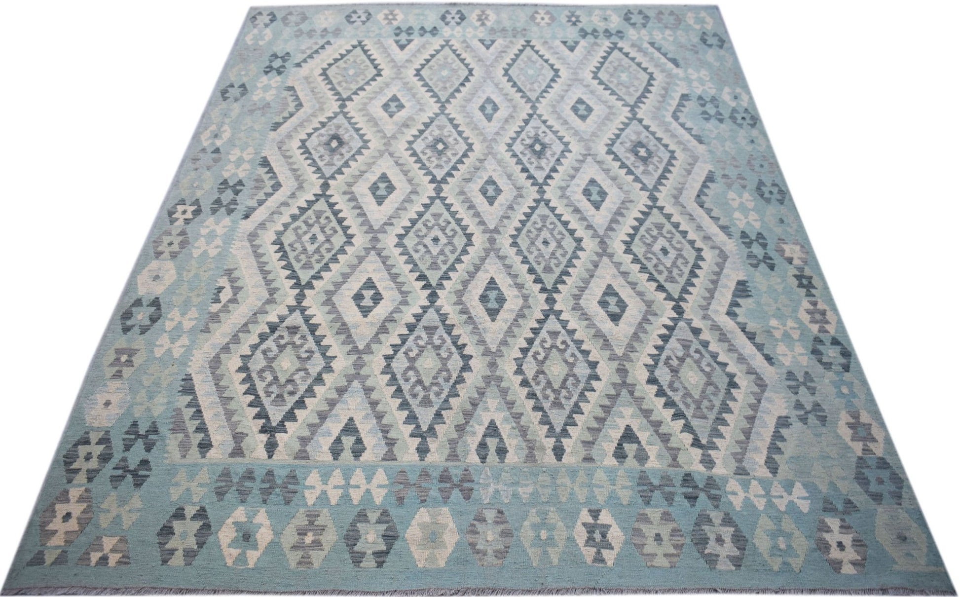 Handwoven Afghan Maimana kilim rug featuring a light blue and grey geometric diamond pattern.