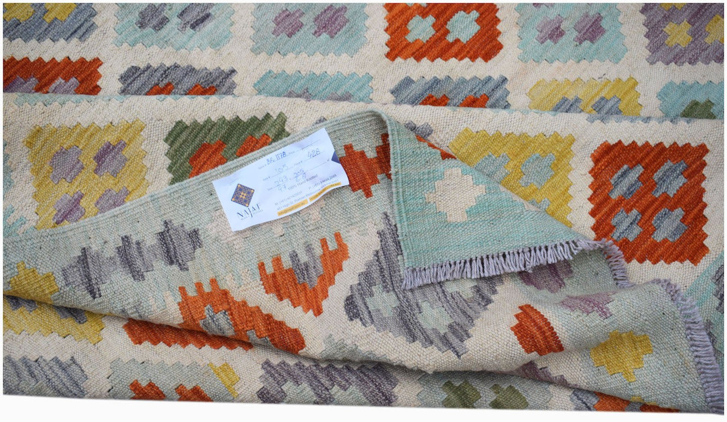 Handwoven Afghan Maimana kilim rug featuring a geometric pattern in orange, yellow, and grey.