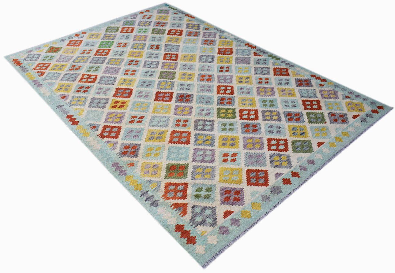 Handmade Afghan Maimana kilim rug featuring a colorful geometric diamond pattern on a light base.