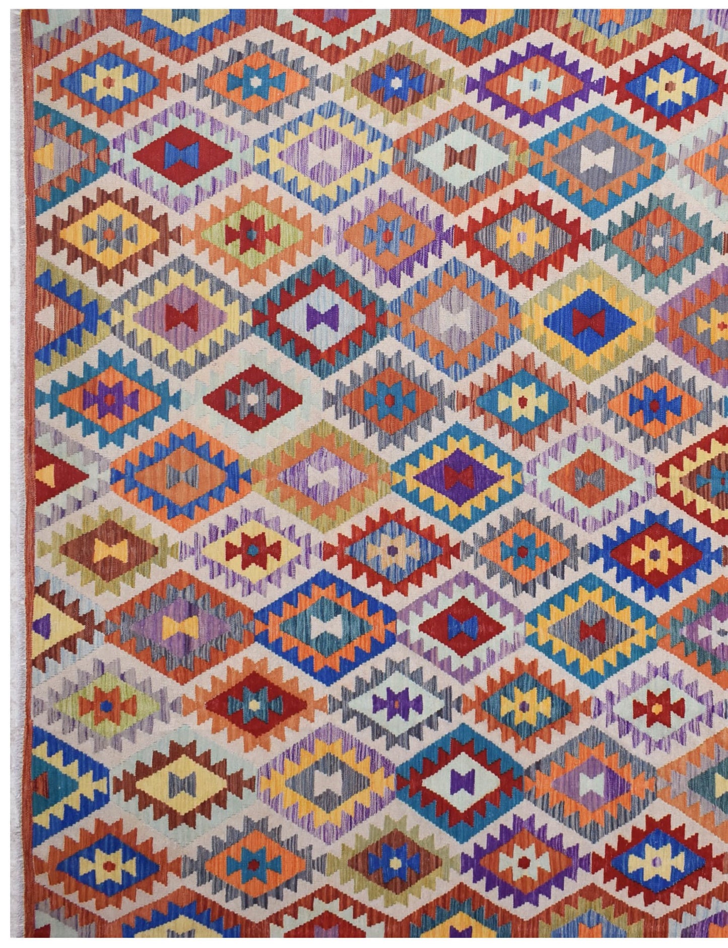 Handmade Afghan Maimana kilim rug featuring a vibrant, multicolored geometric diamond pattern.