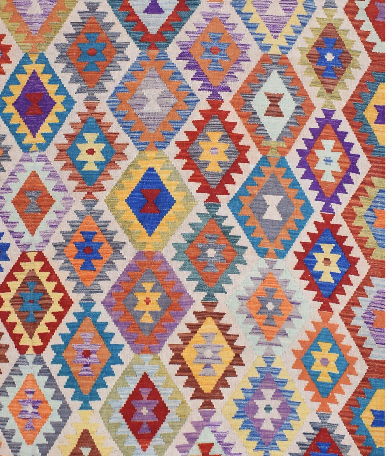 Handmade Afghan Maimana kilim rug featuring a vibrant, multicolored geometric diamond pattern.