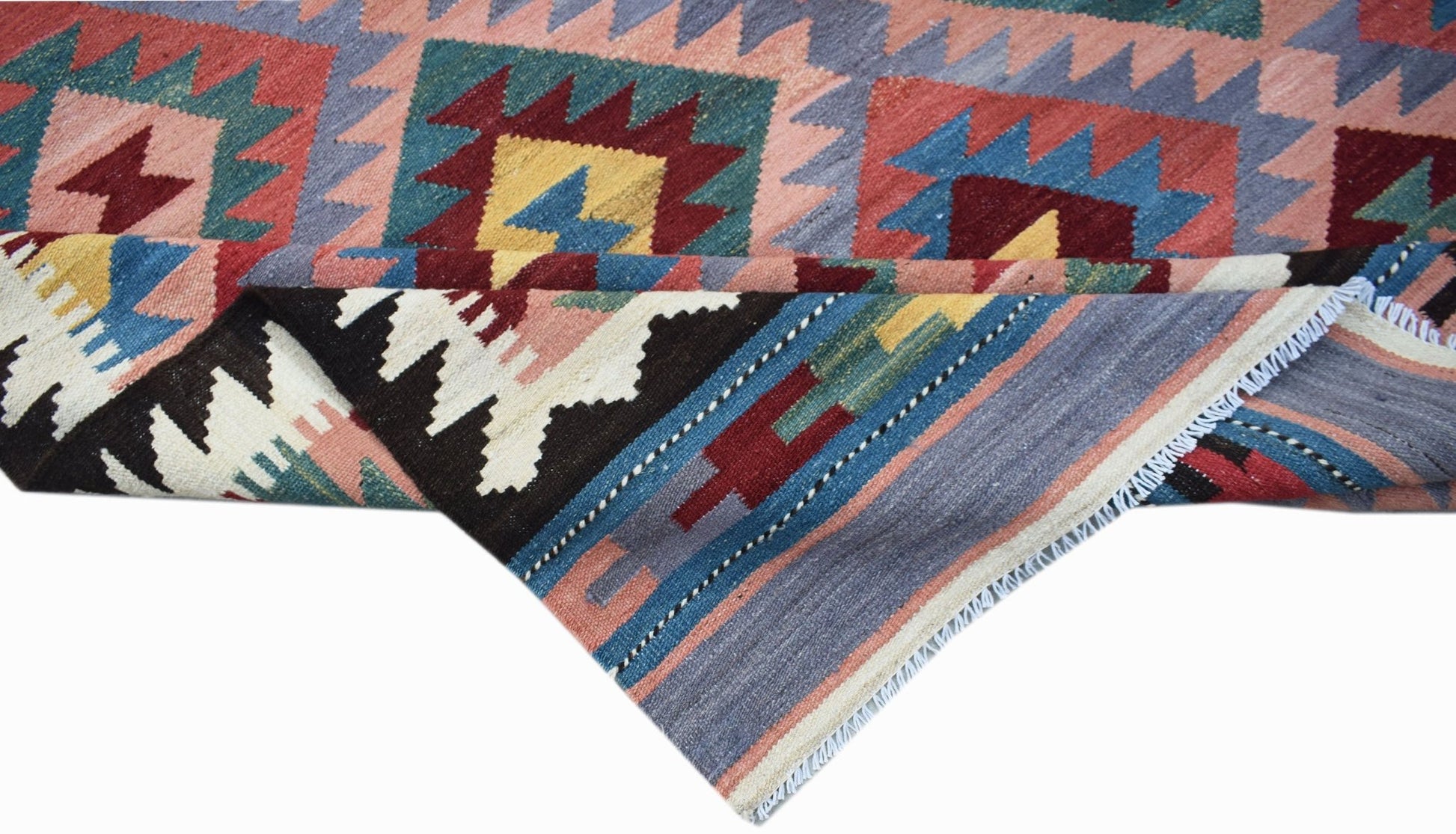 A handmade Afghan Maimana kilim rug featuring geometric patterns in red, blue, and yellow wool.