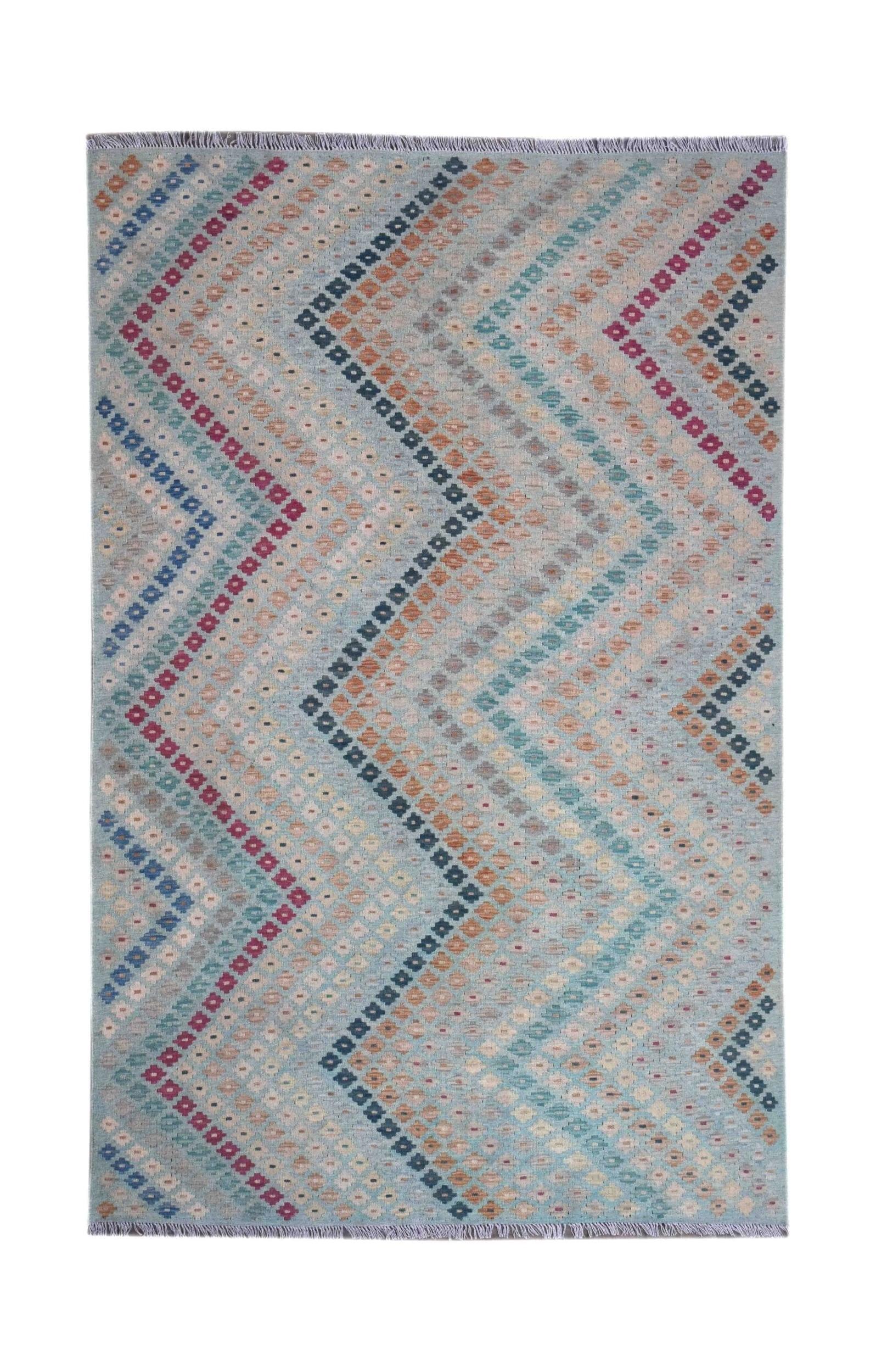 Handmade Afghan Maimana kilim rug featuring a light blue background with geometric chevron patterns.