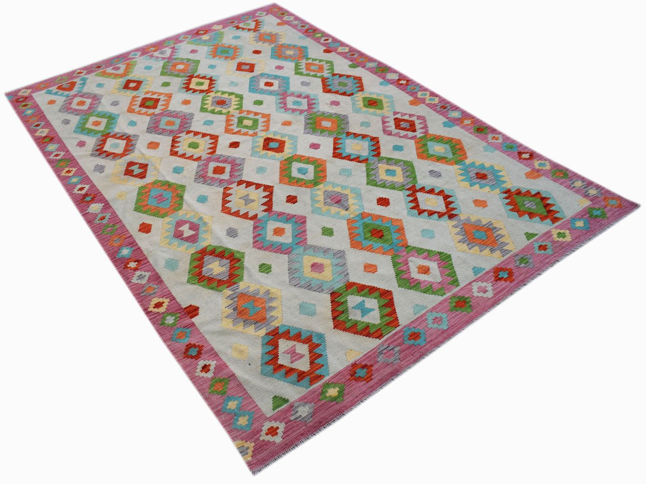 Handwoven Afghan Maimana kilim rug featuring a colorful geometric diamond pattern on a light base.