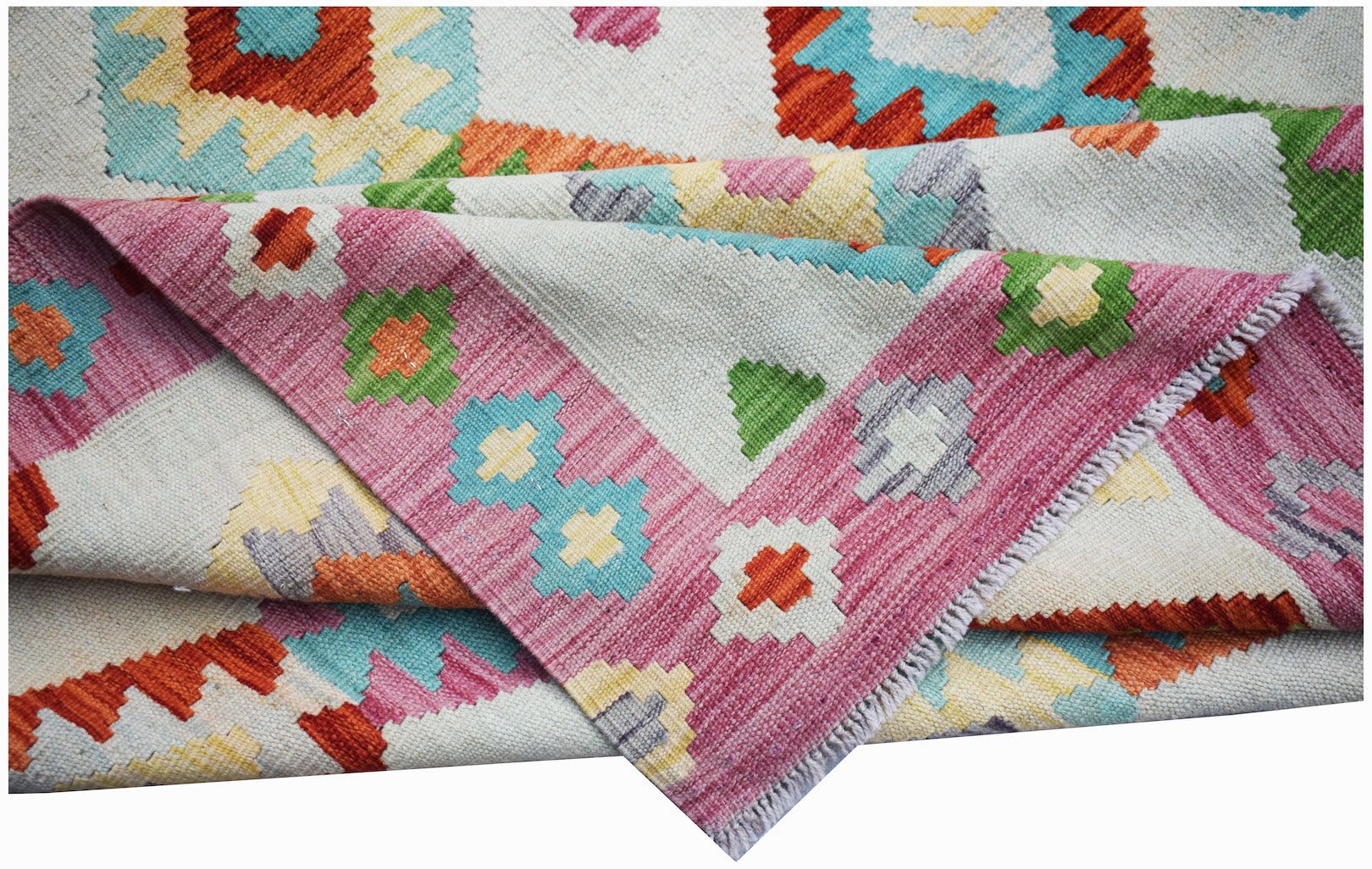 Handwoven Afghan Maimana kilim rug featuring a colorful geometric pattern on a cream background.