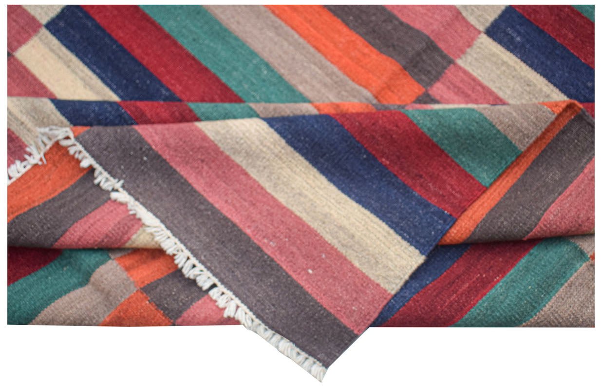 Handwoven Afghan Maimana kilim rug featuring a vibrant pattern of multicolored diagonal stripes.