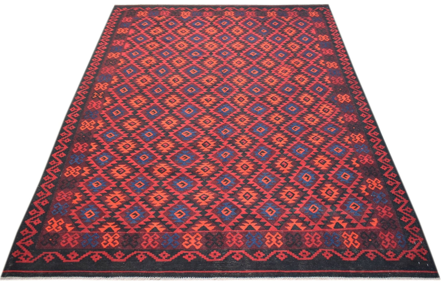 Handwoven Afghan Maimana kilim rug featuring a repeating geometric diamond pattern in red and blue.