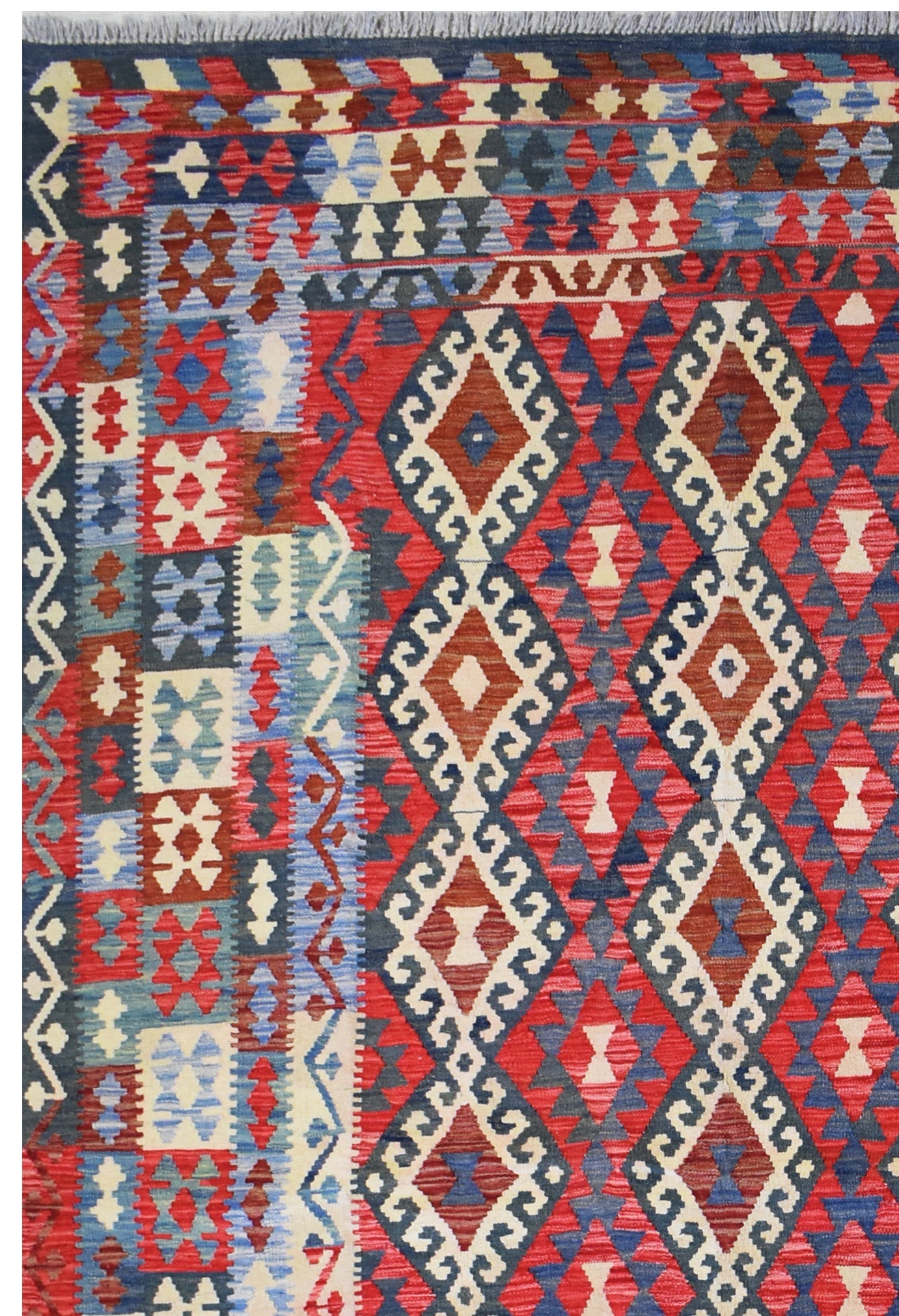 Handmade Afghan Maimana kilim rug featuring a geometric diamond pattern in red, blue, and cream.