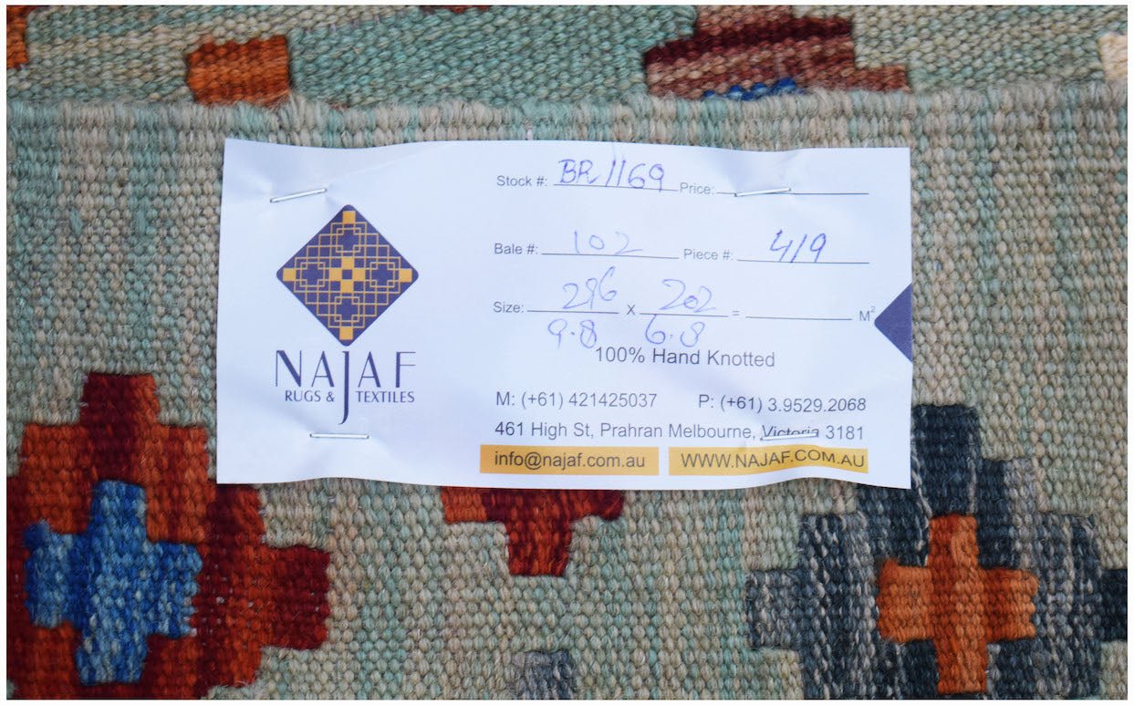 A handwoven Afghan Maimana Kilim featuring a geometric pattern in blue, orange, and grey tones.