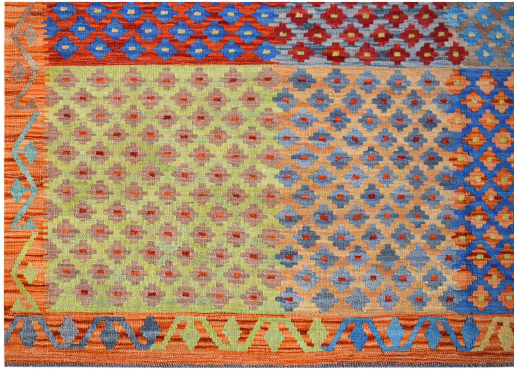 Handwoven Afghan Maimana kilim rug featuring a colorful geometric patchwork pattern in wool.
